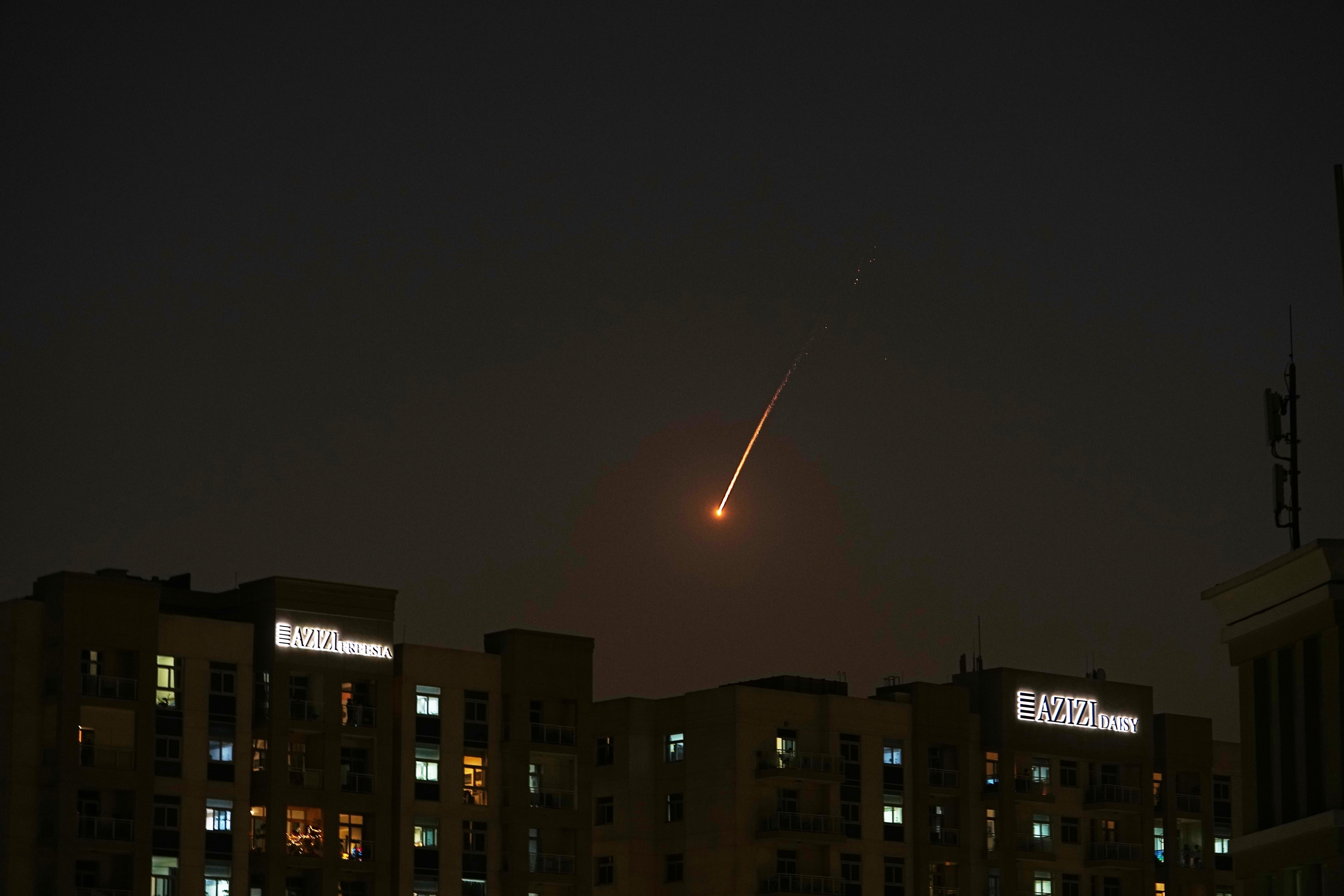 A flare from a projectile seen over Dubai (Fatima Shbair/AP)