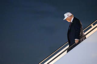 US president Donald Trump steps off Air Force One at Palm Beach International Airport in West Palm Beach, Florida, on 27 February 2026