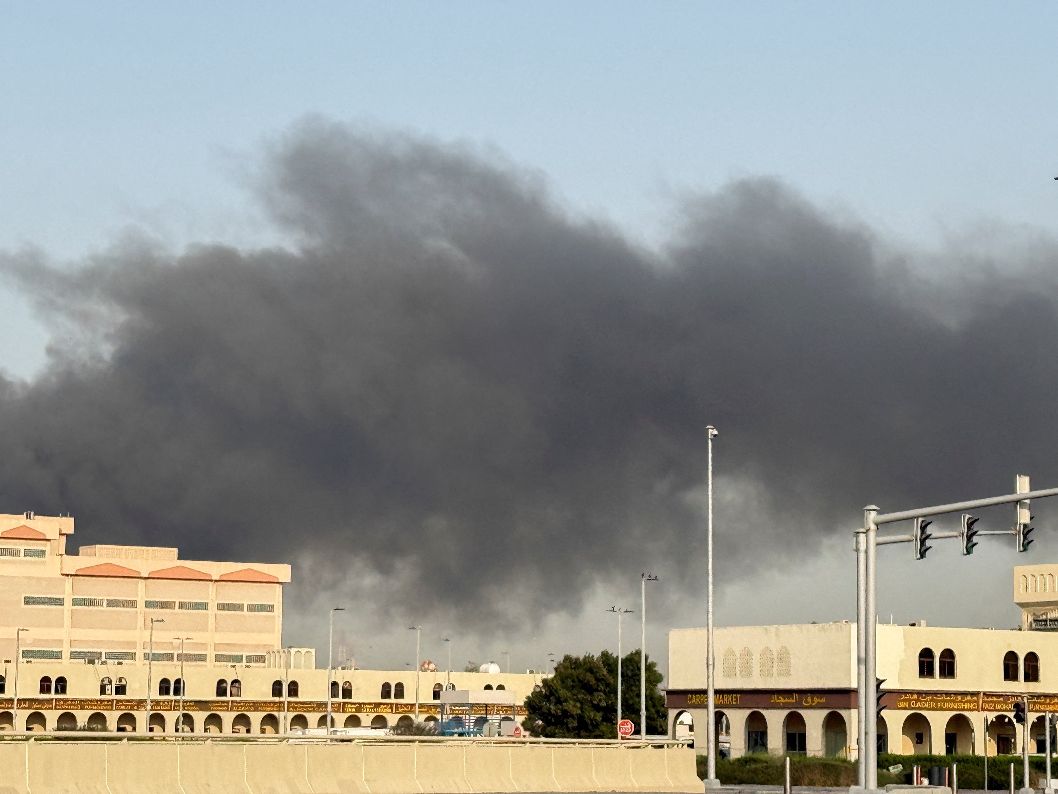 Smoke billows from Zayed port after an Iranian attack in Abu Dhabi