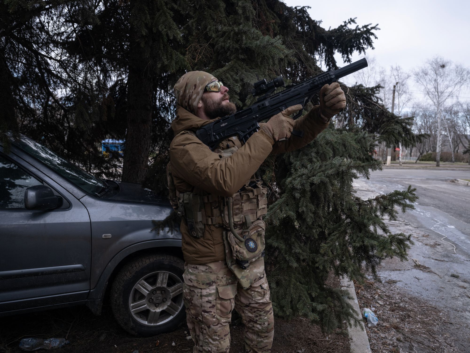 This handout photograph taken and released by the press service of the 93rd Kholodnyi Yar Separate Mechanized Brigade of the Ukrainian Ground Forces on February 27, 2026 shows a Ukrainian serviceman of the Alcatraz Battalion Evacuation Group looking for a Russian drone near Druzhkivka in the Donetsk region
