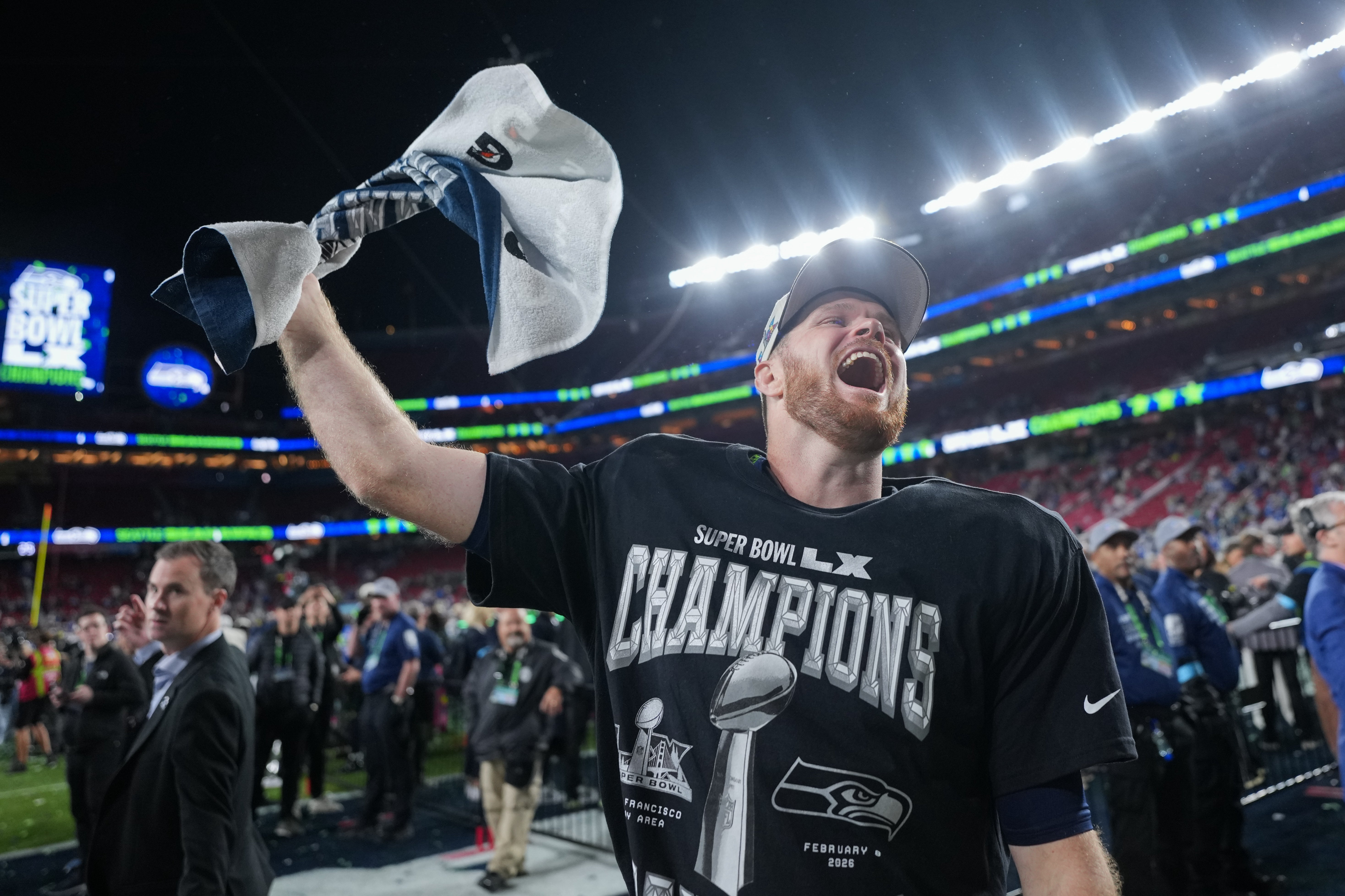 Brendan Carr has bemoaned the difficulty in navigating the sports streaming landscape. Pictured here is Seattle Seahawks quarterback Sam Darnold celebrating after his team won the Super Bowl this year