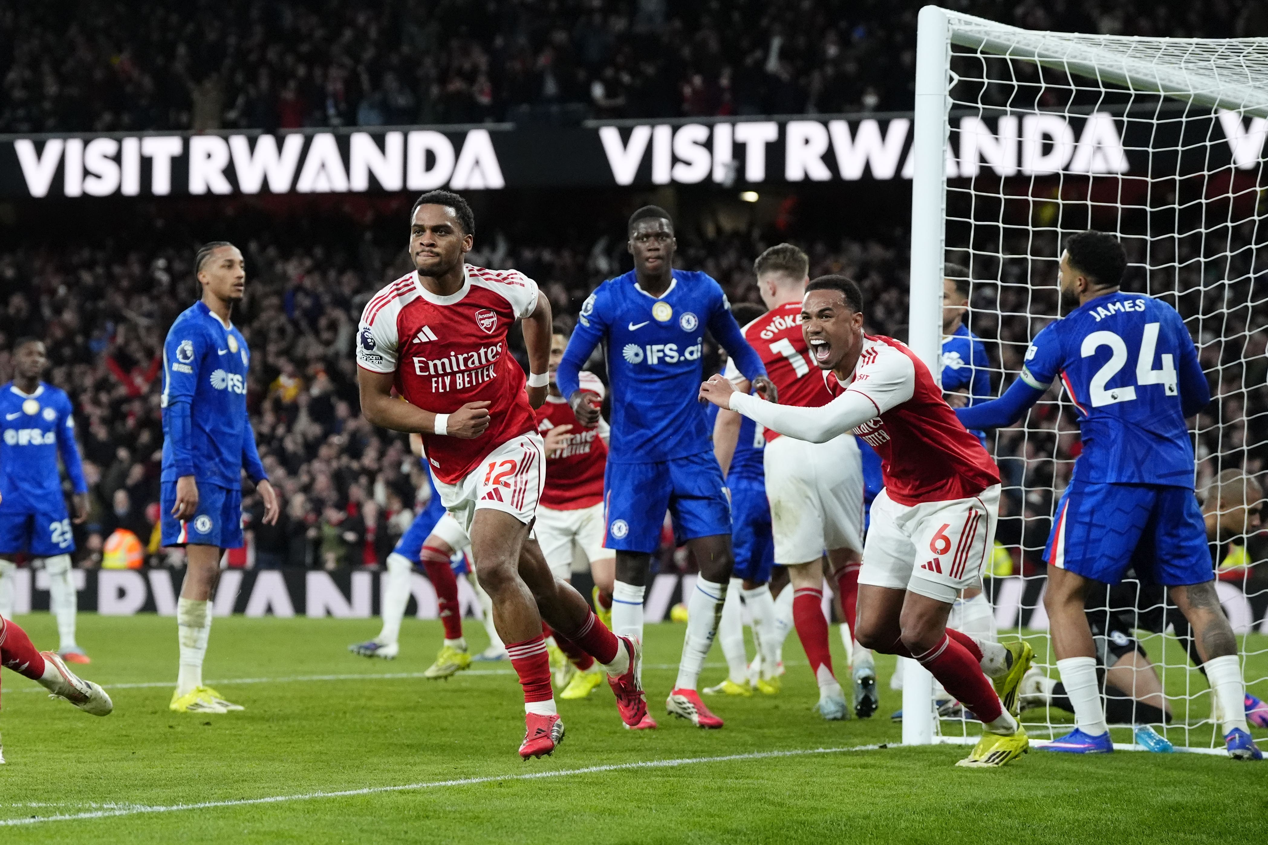 Arsenal’s Jurrien Timber (centre left) celebrates after scoring the winner against Chelsea last season