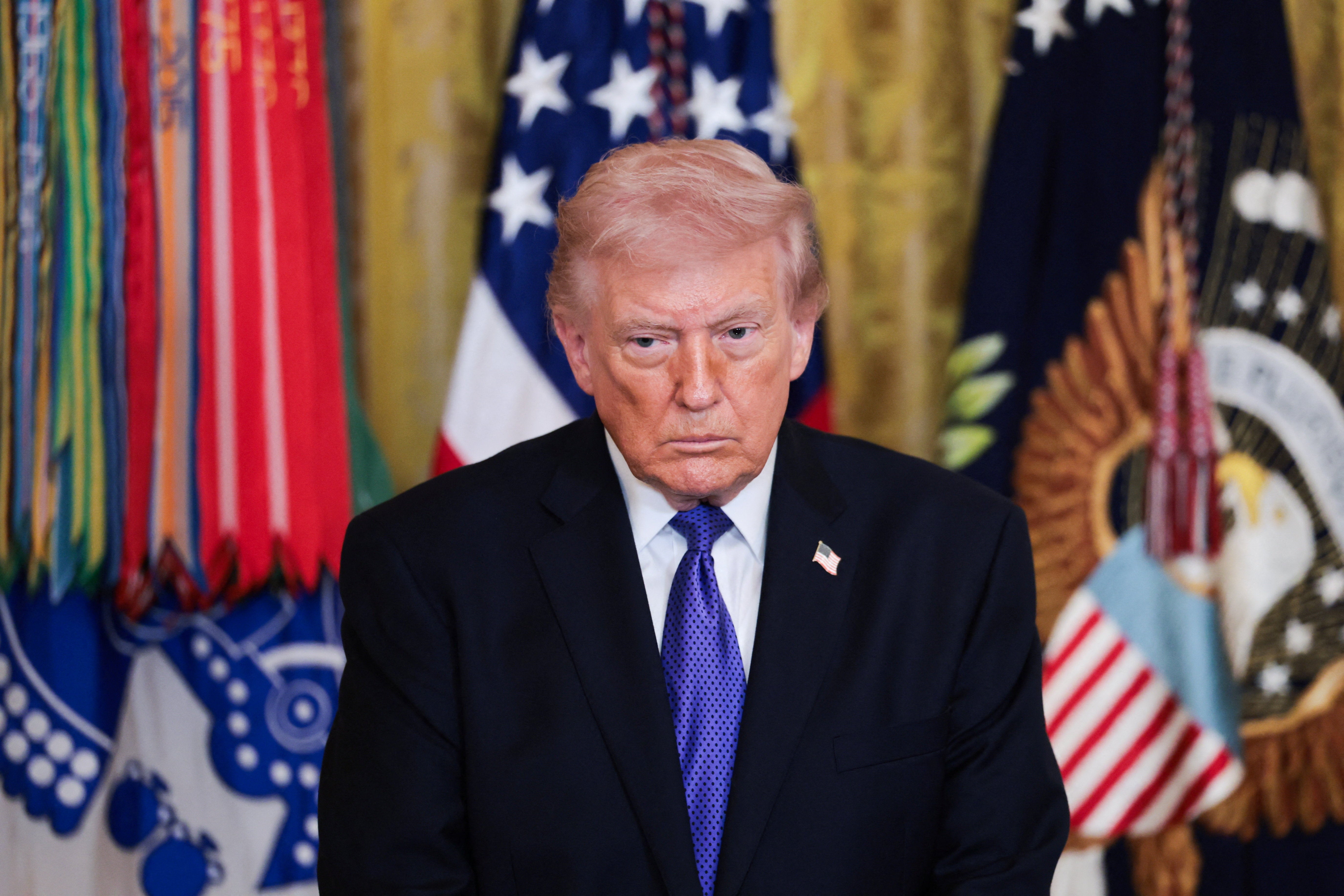 News reports over the weekend indicated the president made quick sporatic phone calls to journalists, offering vague and different goals for the US operation in Iran (Reuters)