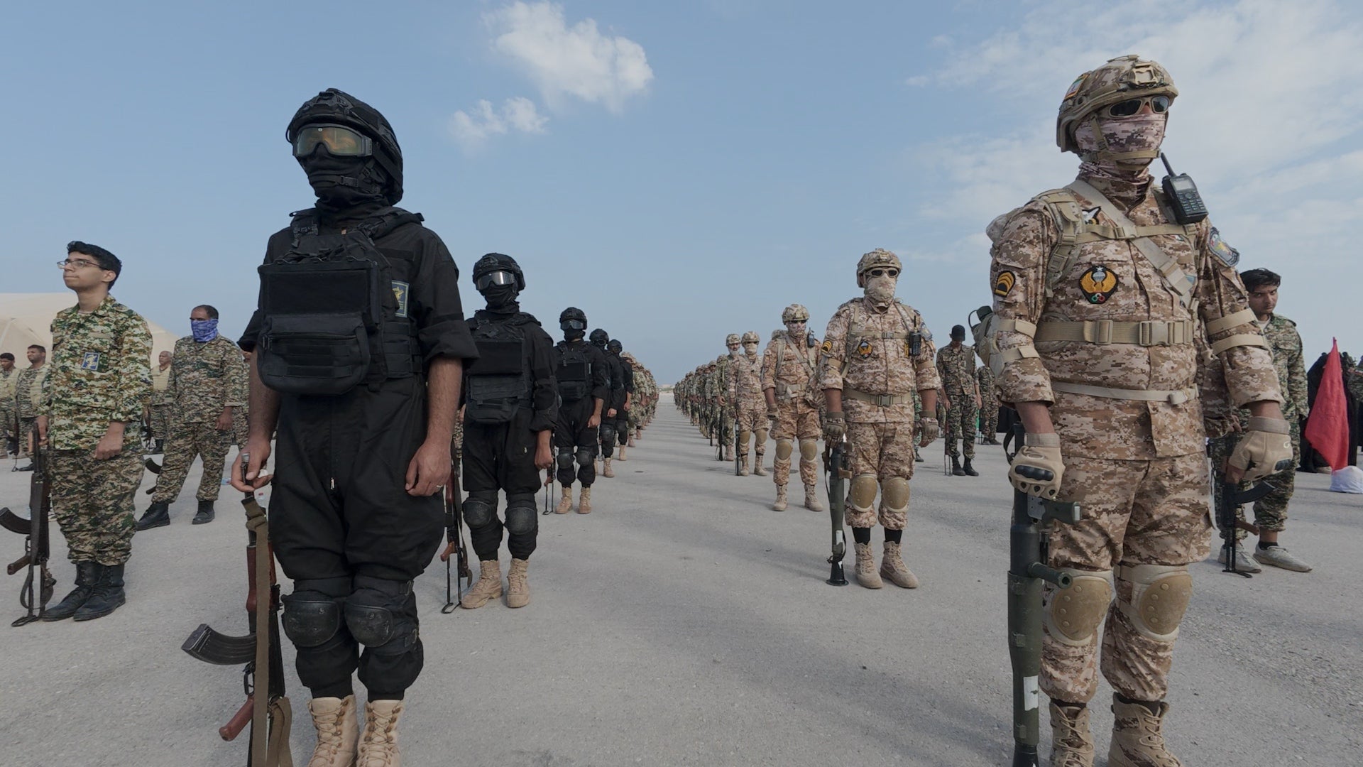 Merchant told the jury he was carrying out instructions from a contact in the Islamic Republic’s powerful paramilitary Revolutionary Guard. In this image provided by Sepahnews of the Iranian Revolutionary Guard shows troops standing at attention during the guard's drill in the Persian Gulf