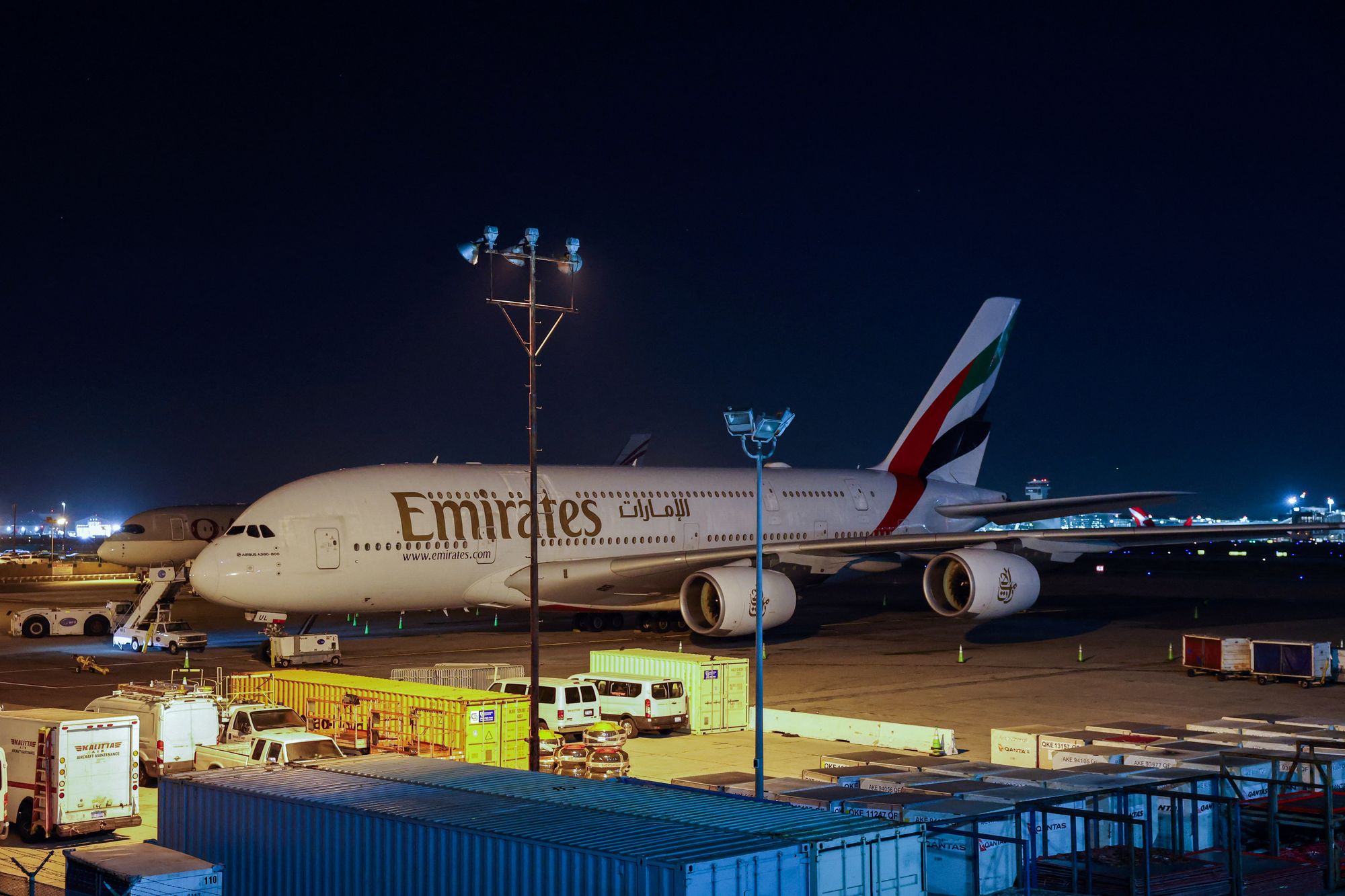 An Emirates airliner sits parked at Los Angeles International Airport (LAX) in Los Angeles, California on 2 March 2026, after its return flight to Dubai International Airport (DXB) was cancelled due to the war in the Middle East