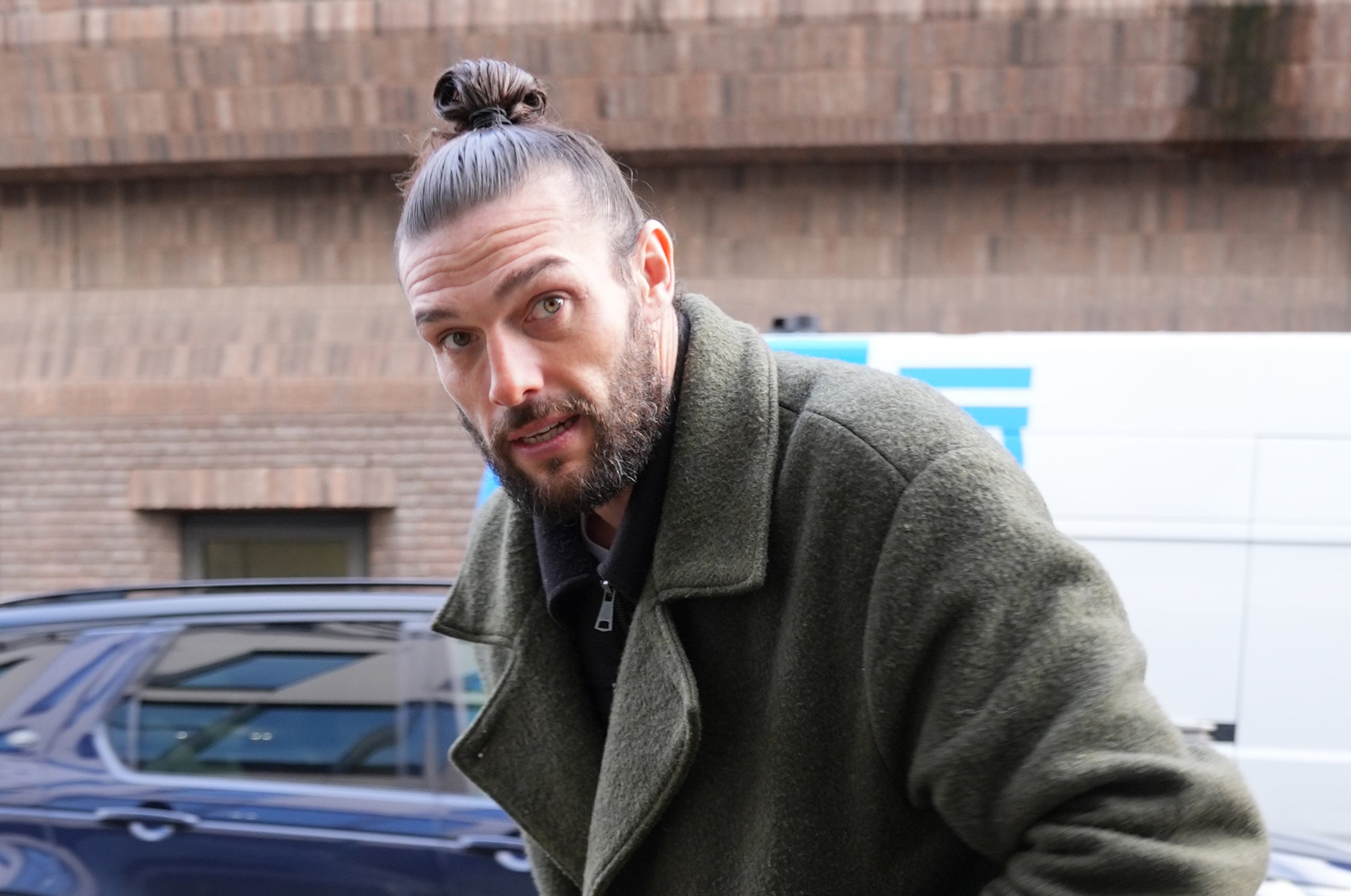 Ex-Liverpool striker Andy Carroll to stand trial after being accused of breaching court order against ex-wife