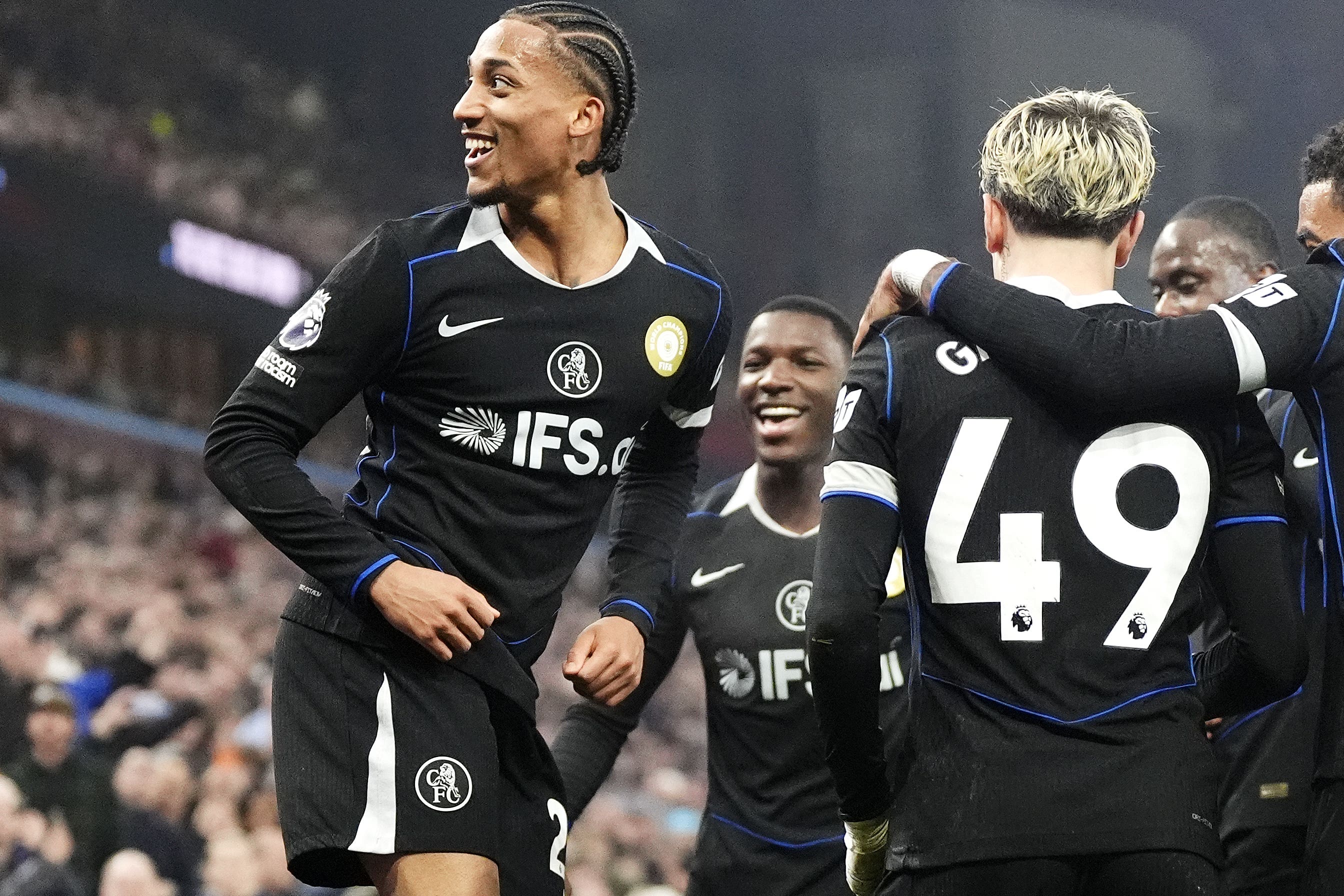 Chelsea’s Joao Pedro, left, celebrates his hat-trick goal at Villa Park