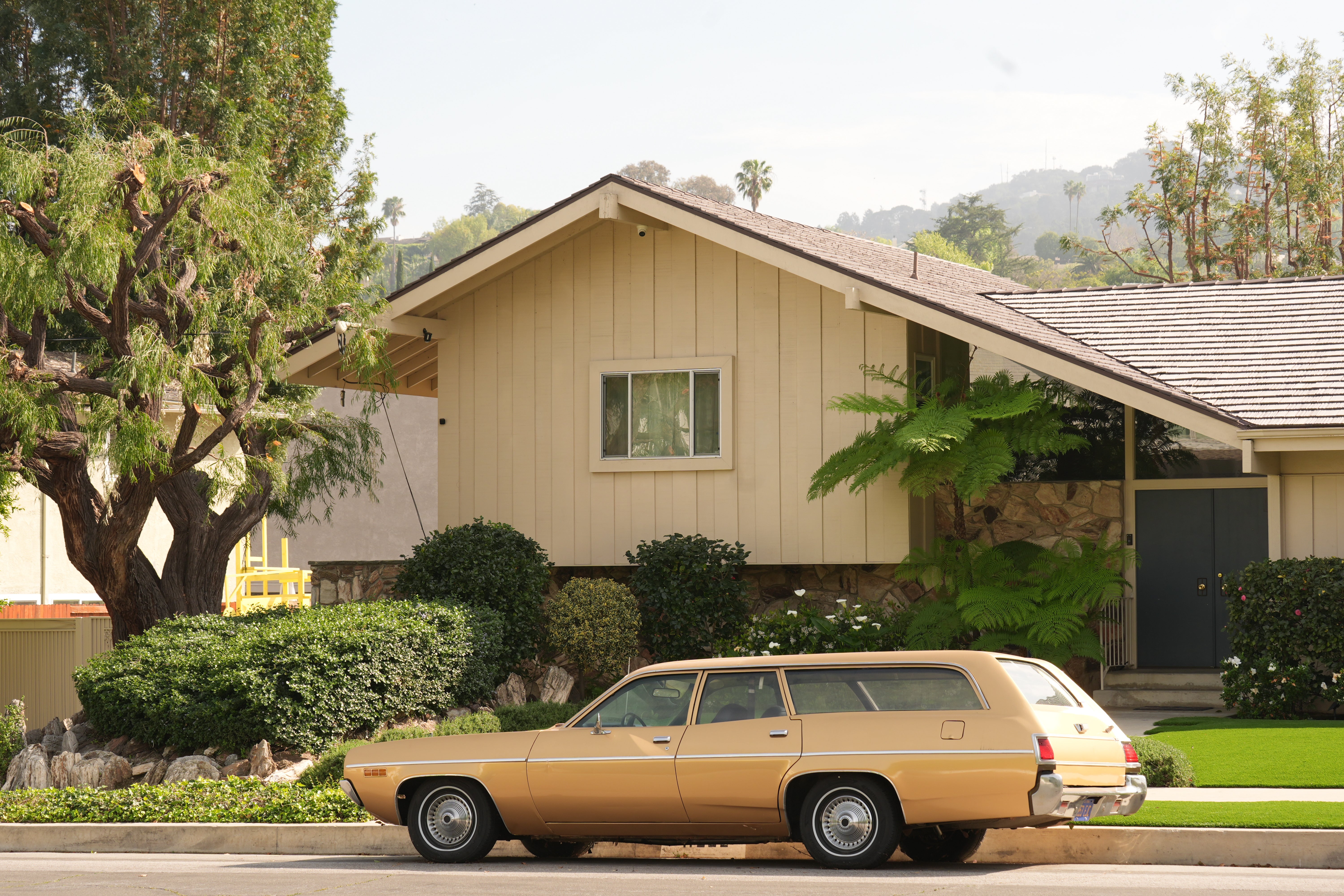 The shingle-and-stone home with a peaked roof also appeared in the 1995 big-screen film The Brady Bunch Movie and its sequel
