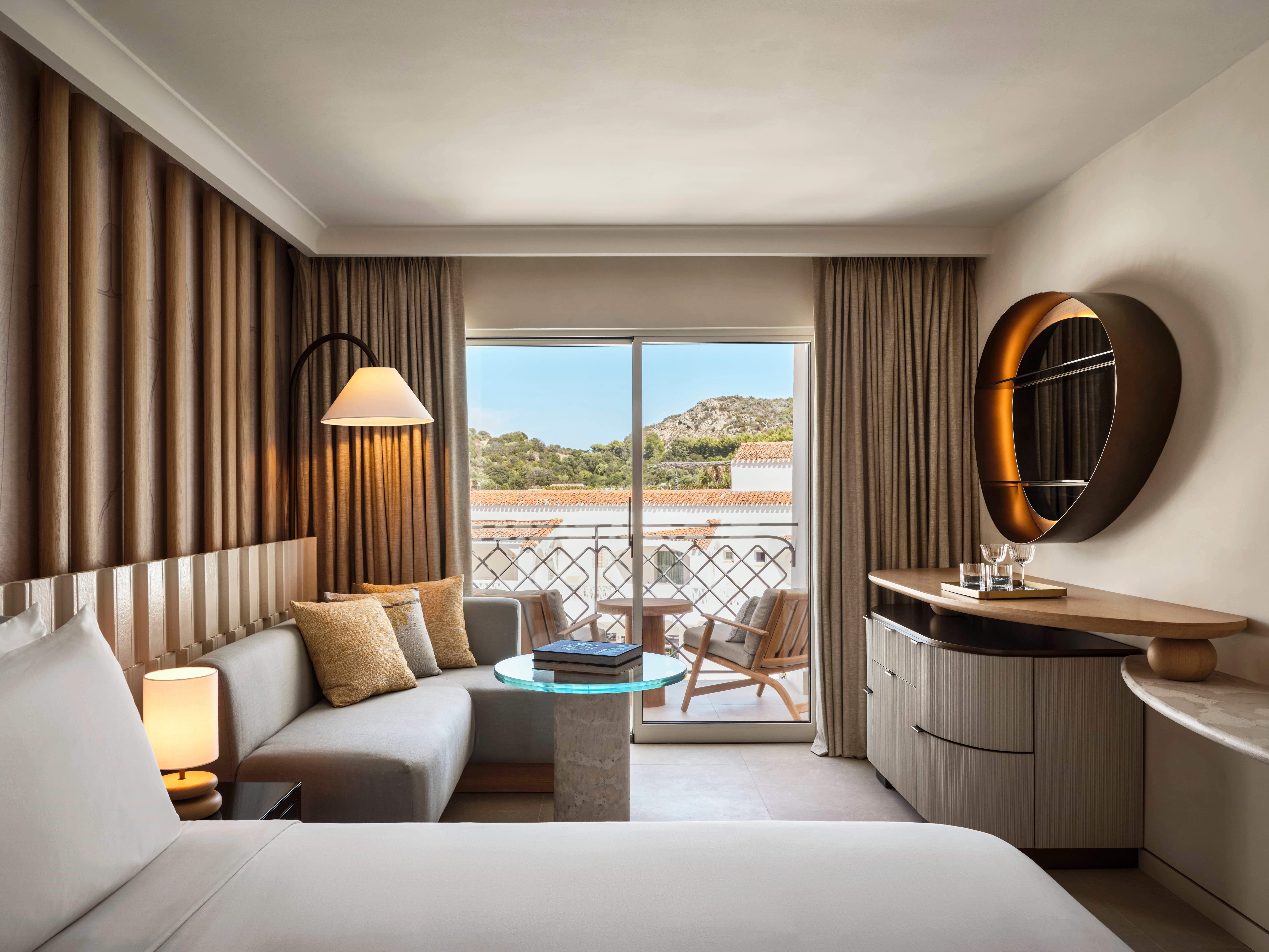 Rooms are sophisticated and are decorated in warm beachy tones