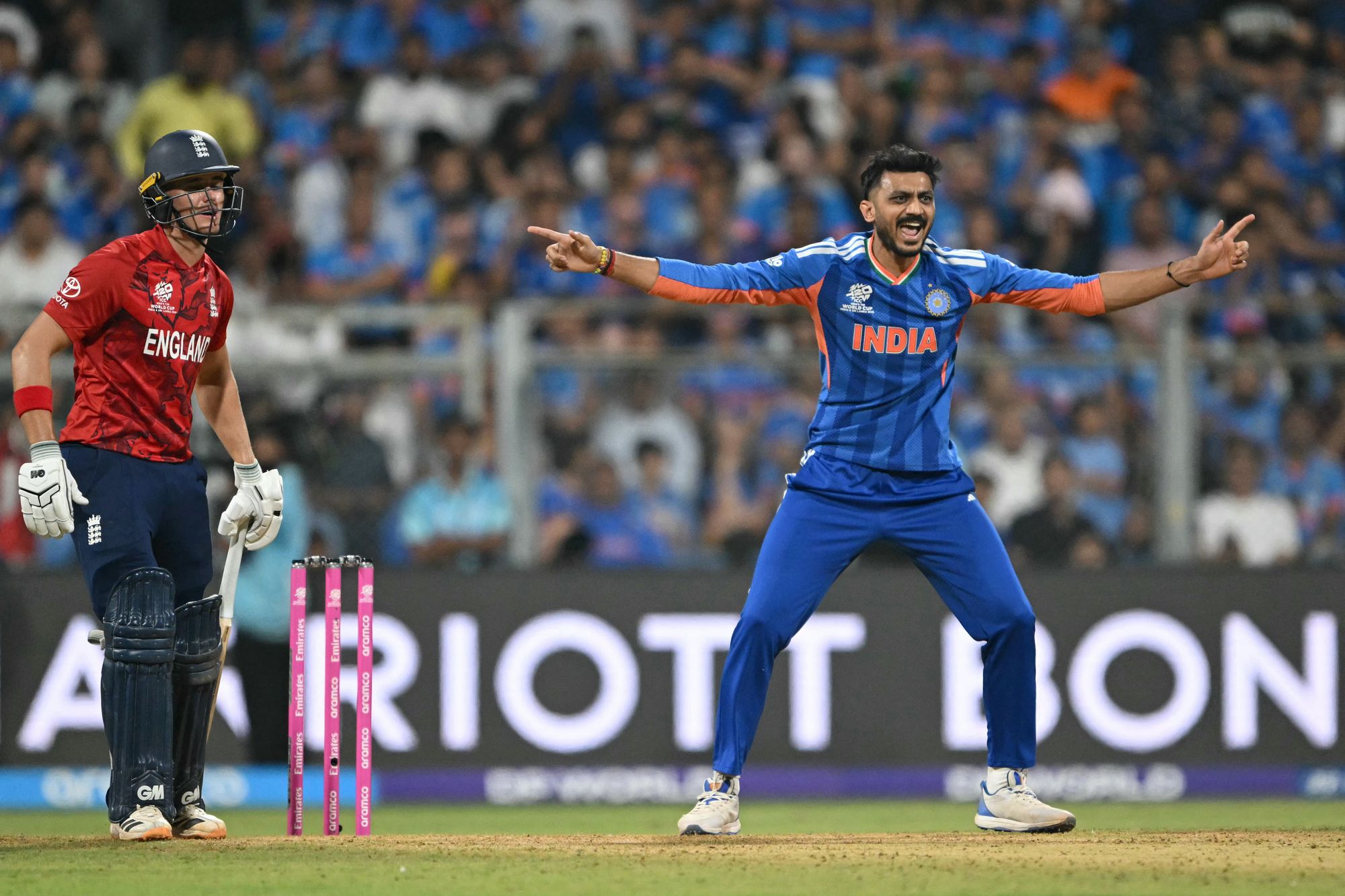 India's Axar Patel celebrates the wicket of Tom Banton during the T20 World Cup semi-final