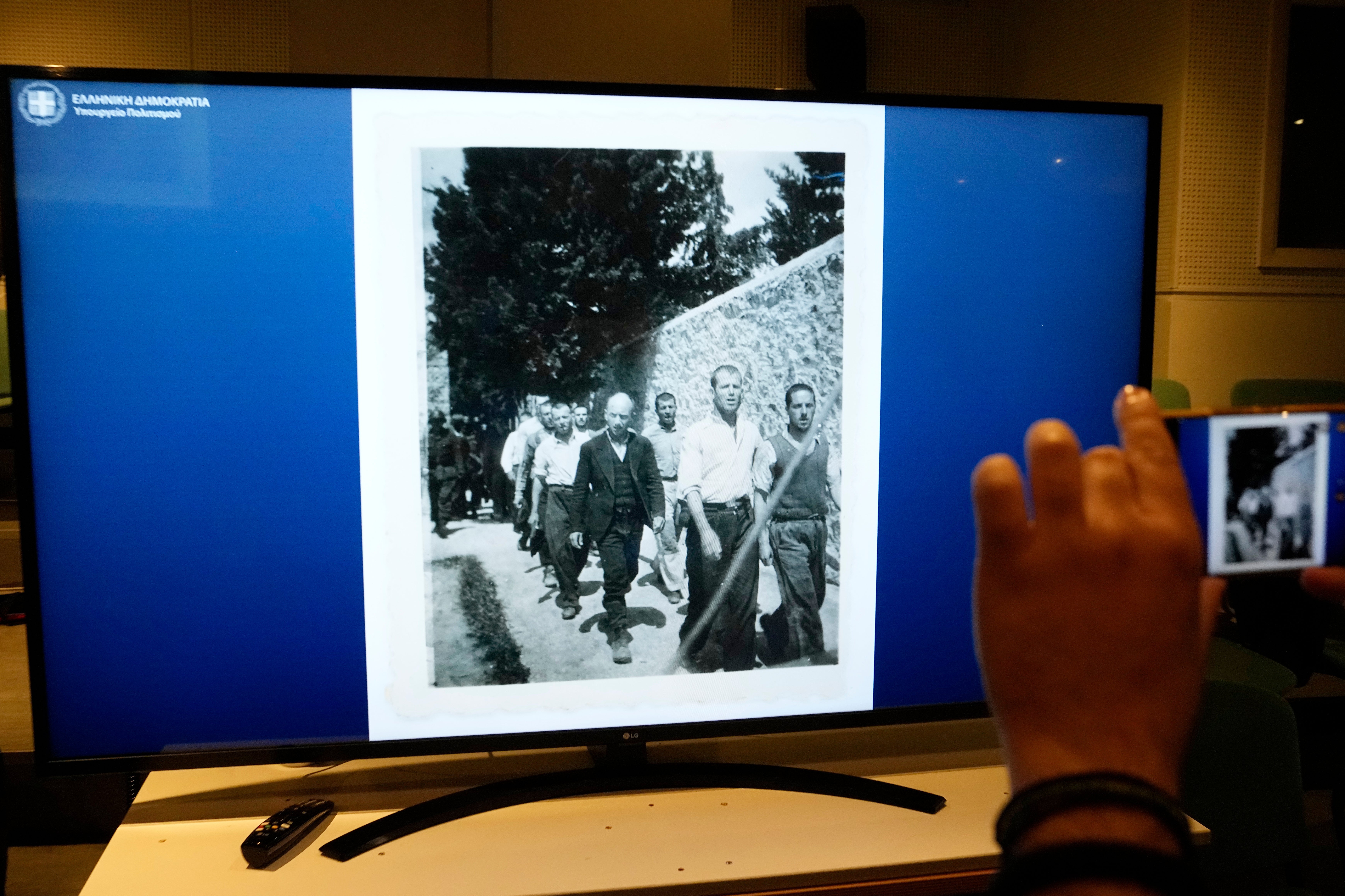 Photographs showing the final moments of Greek prisoners before their execution by Nazi forces at the Kaisariani firing range in Athens on May 1, 1944, are presented at Greece's Culture Ministry after the state acquired the wartime archive, in Athens on Thursday, March 5, 2026. (AP Photo/Thanassis Stavrakis)