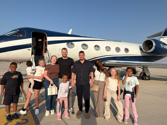 Samuel Leeds, his brother and their family. Mr Leeds says he expects to fly home within a couple of weeks