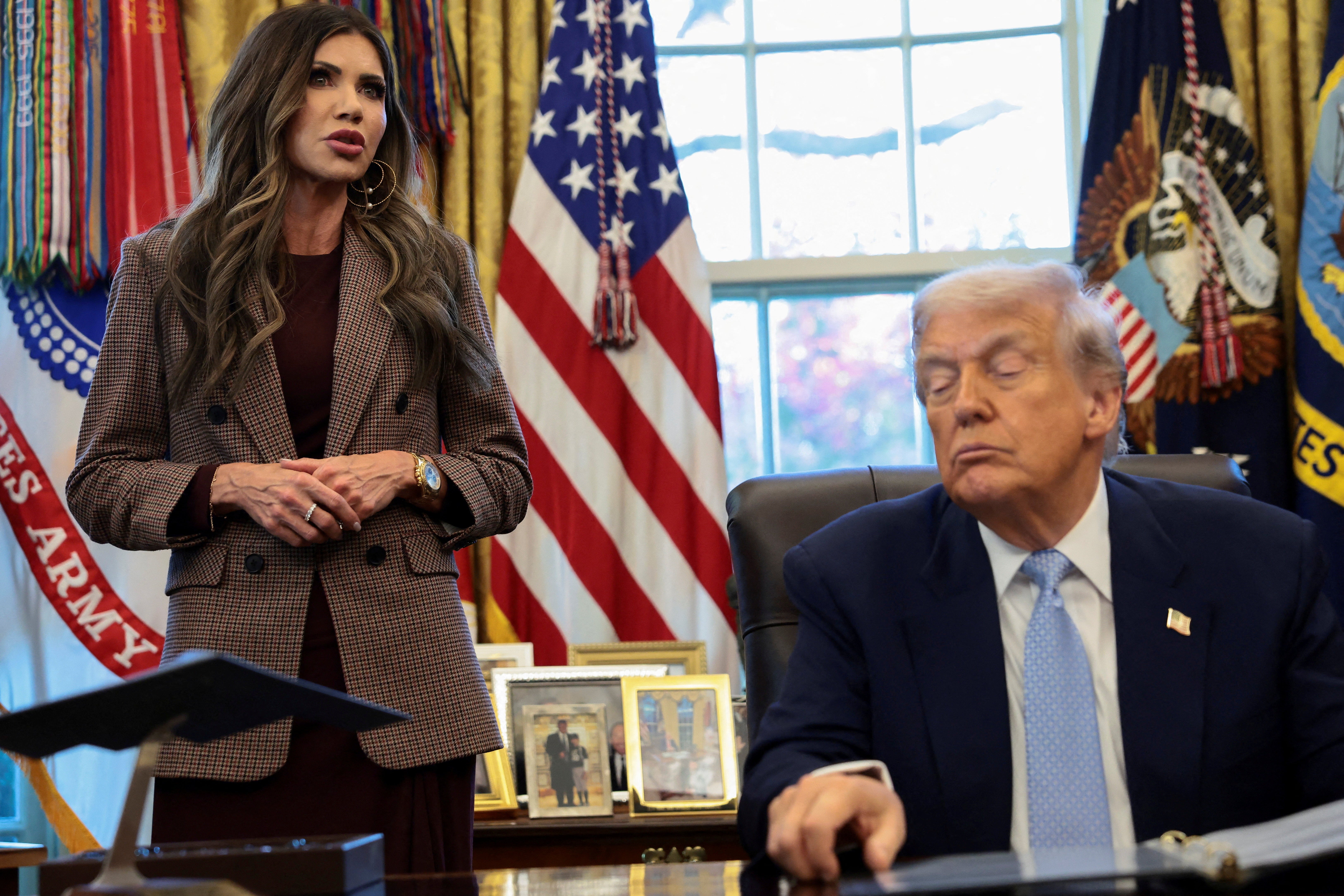 As Kristi Noem (pictured in the Oval Office) spoke in Nashville Thursday, the news broke — mid-sentence — that President Donald Trump had effectively replaced her.