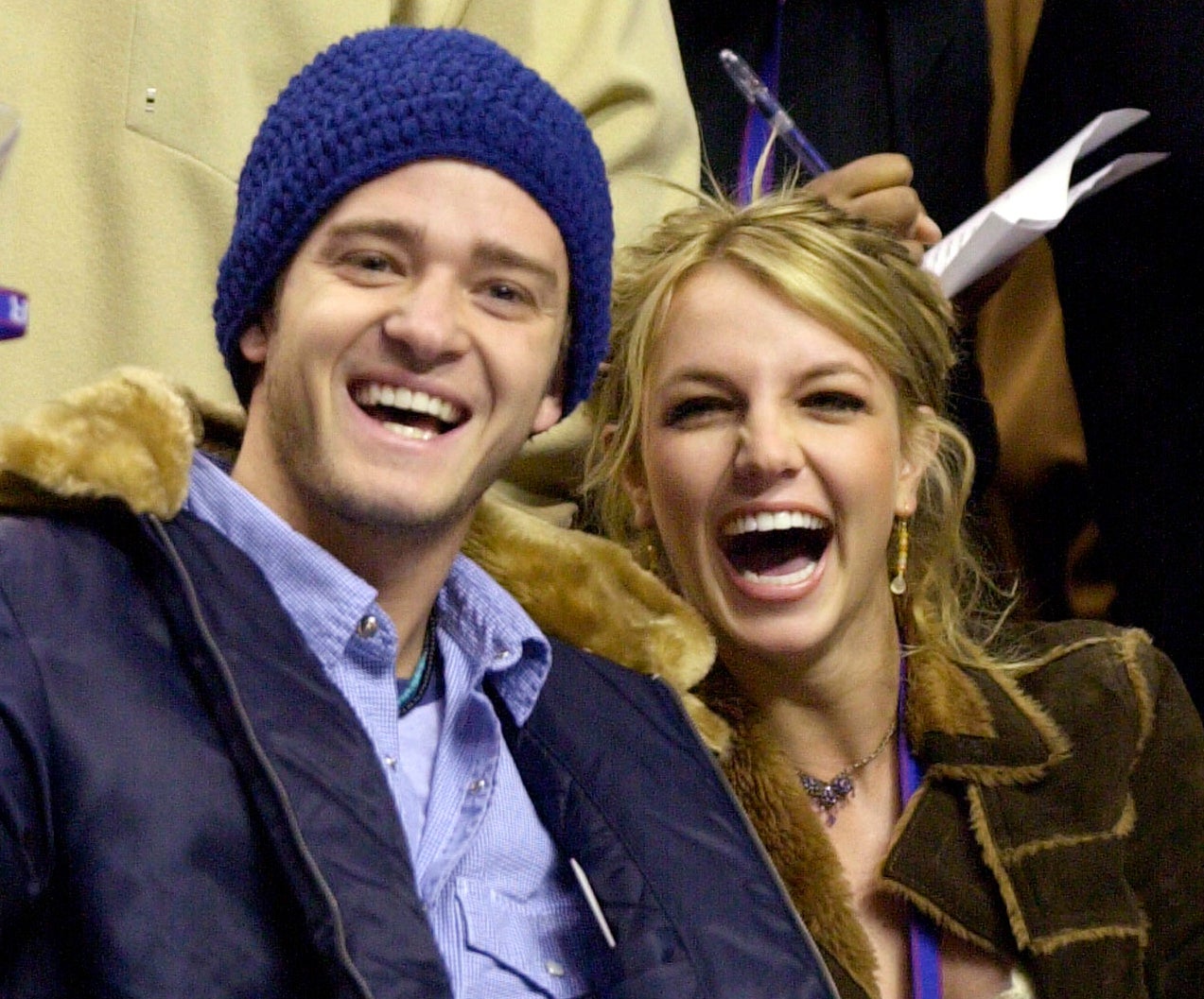 Justin Timberlake, left, and Britney Spears appear at a 2002 NBA All-Star game