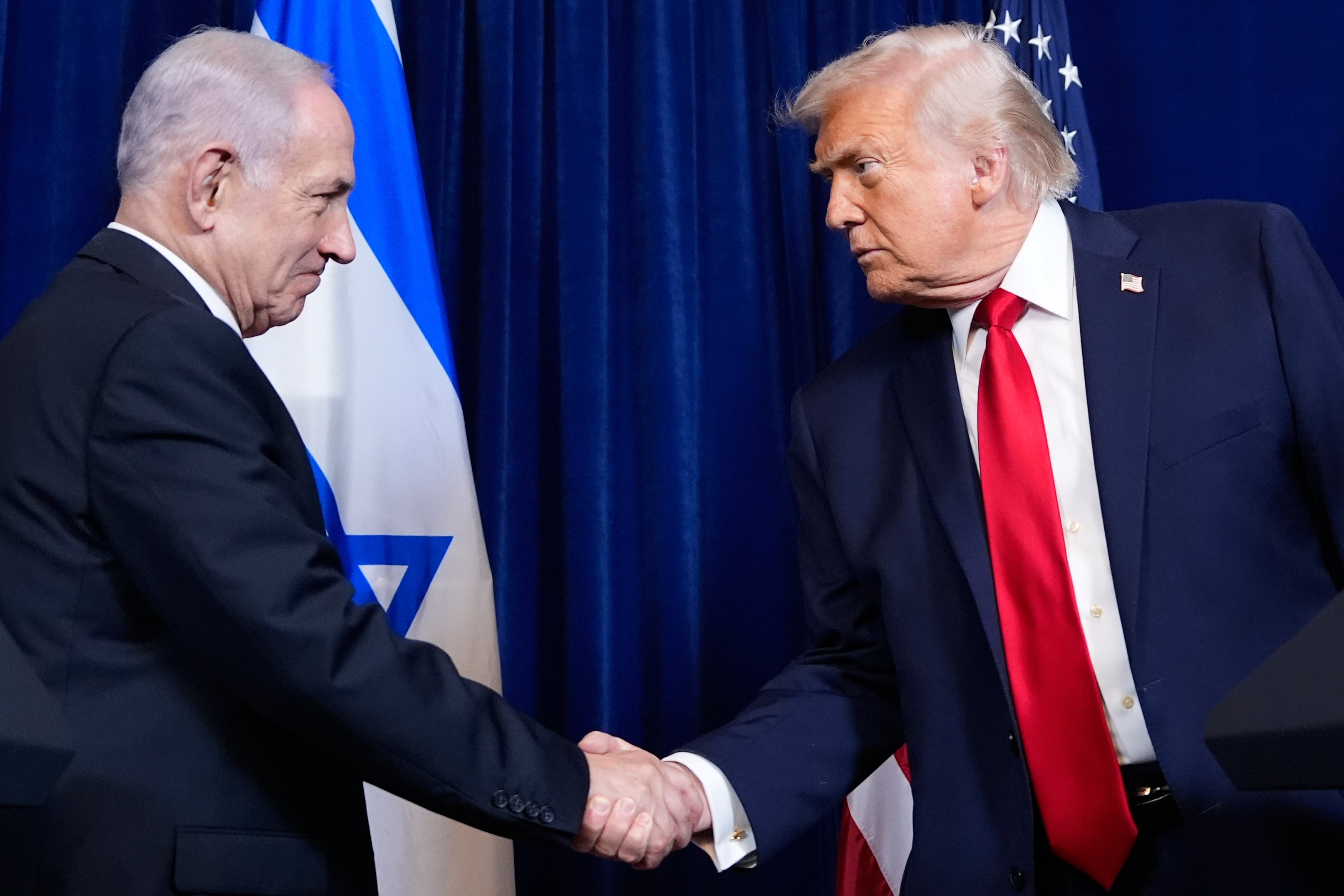 President Donald Trump shakes hands with Israel's Prime Minister Benjamin Netanyahu