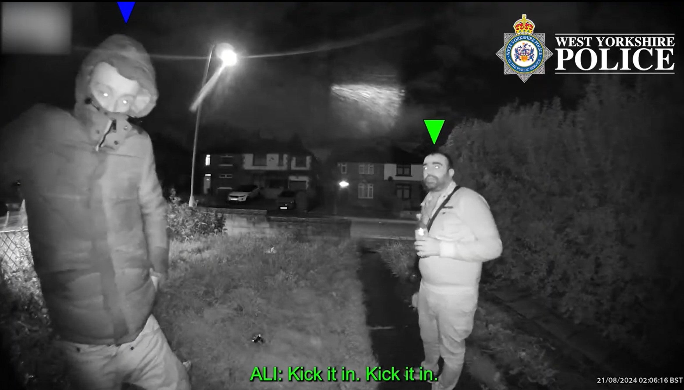 Undated handout CCTV footage originally issued on 10/12/25 by West Yorkshire Police of Callum Sunderland (left) and Sharaz Ali at the house before the fire