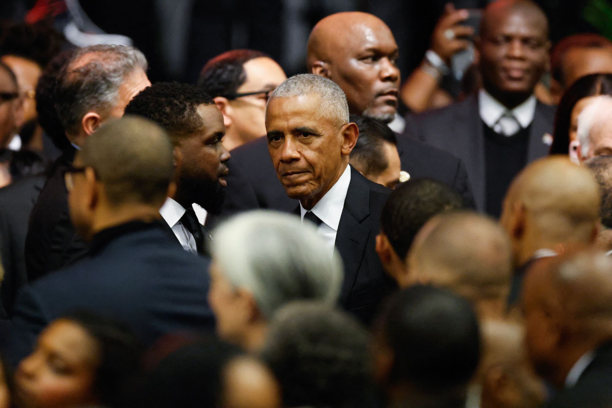 Obama got a hero’s welcome at the service