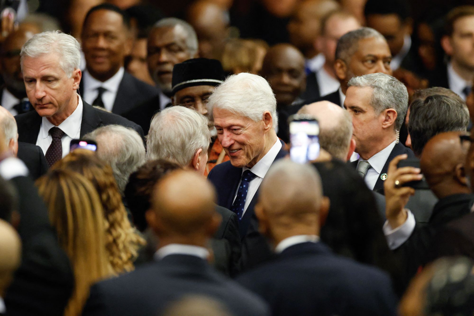 Bill Clinton attended the memorial a few days after a grueling deposition over his ties to Jeffrey Epstein