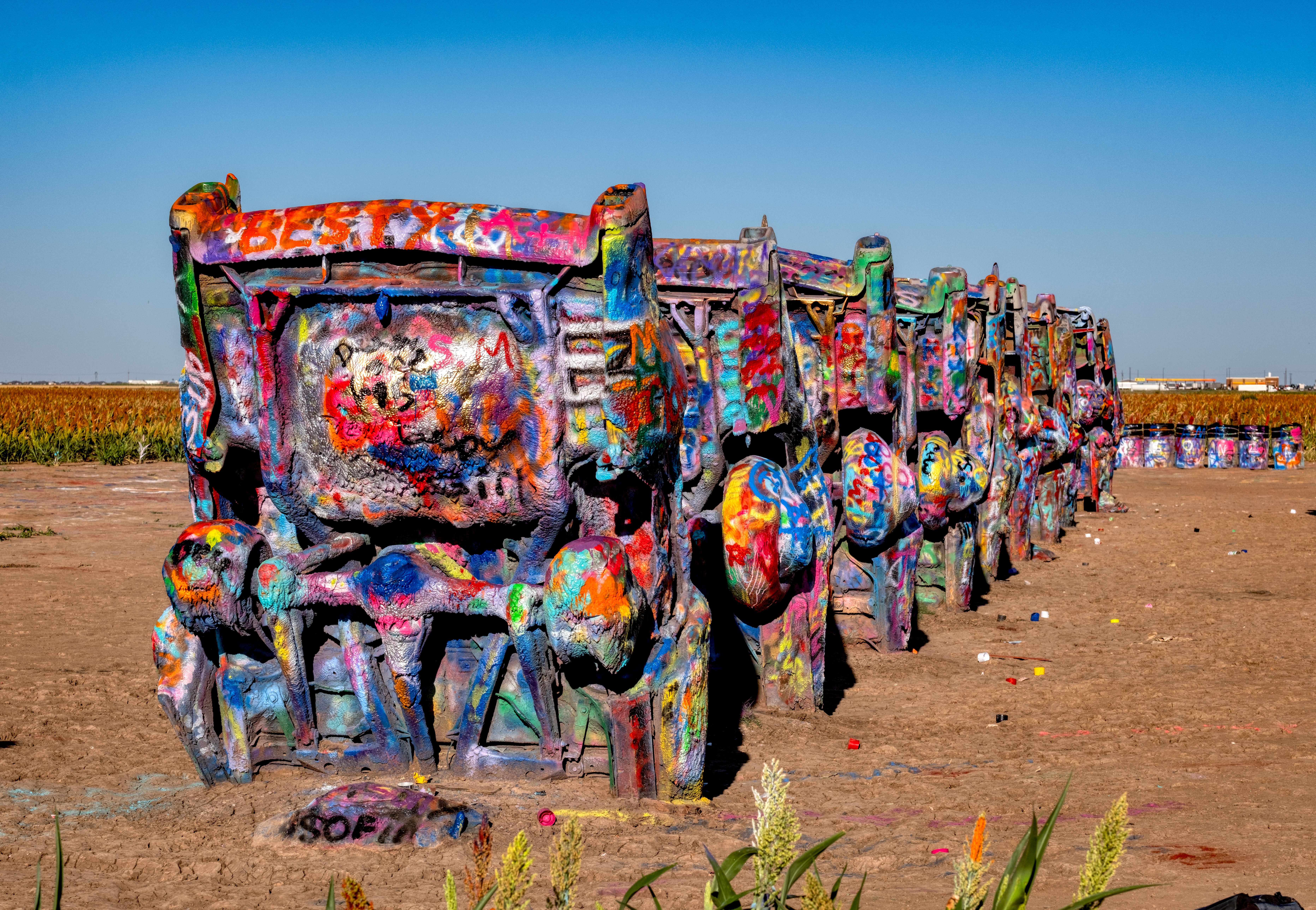 Cadillac Ranch, created in 1974 by the art group Ant Farm, features 10 classic Cadillacs buried nose-first in the ground. It’s a Route 66 must-visit