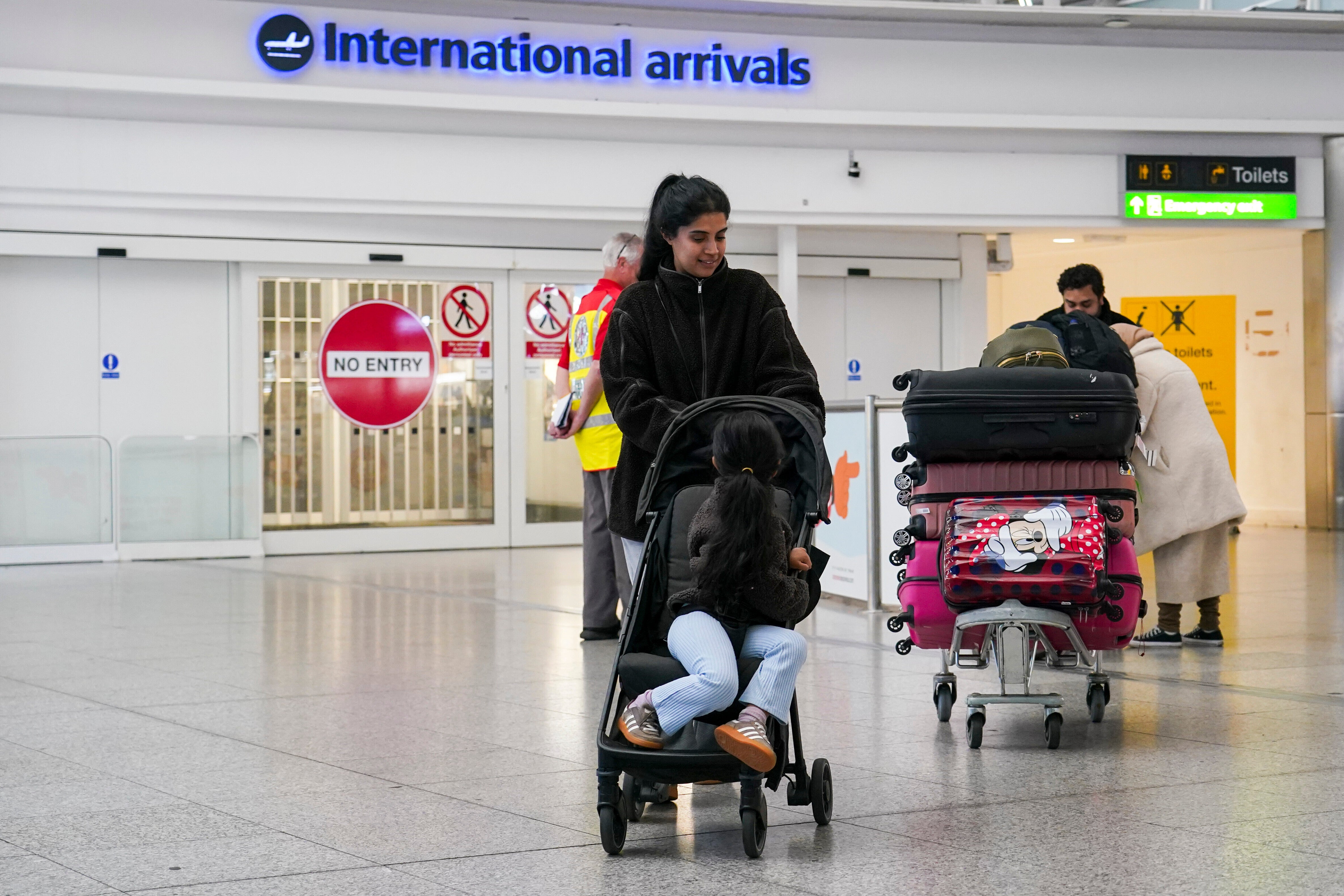 Passengers pictured at Stansted airport pictured at international arrivals