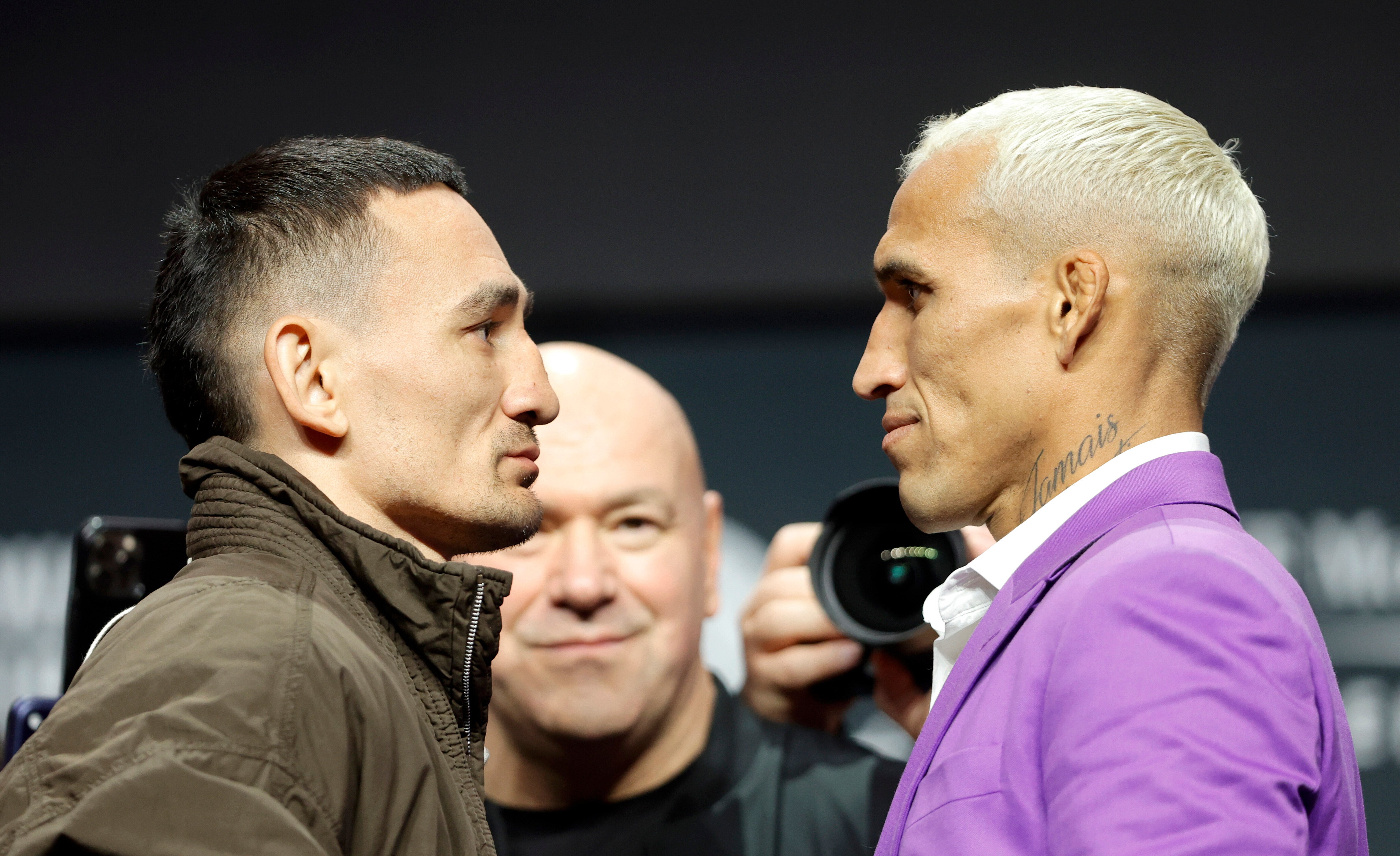 Max Holloway (left) and Charles Oliveira square off in UFC 326’s blockbuster main event