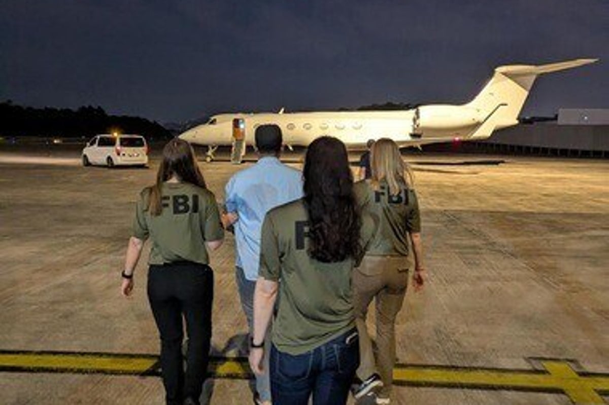 Man accused of tricking hundreds of teens into sending him pornographic images is brought to US