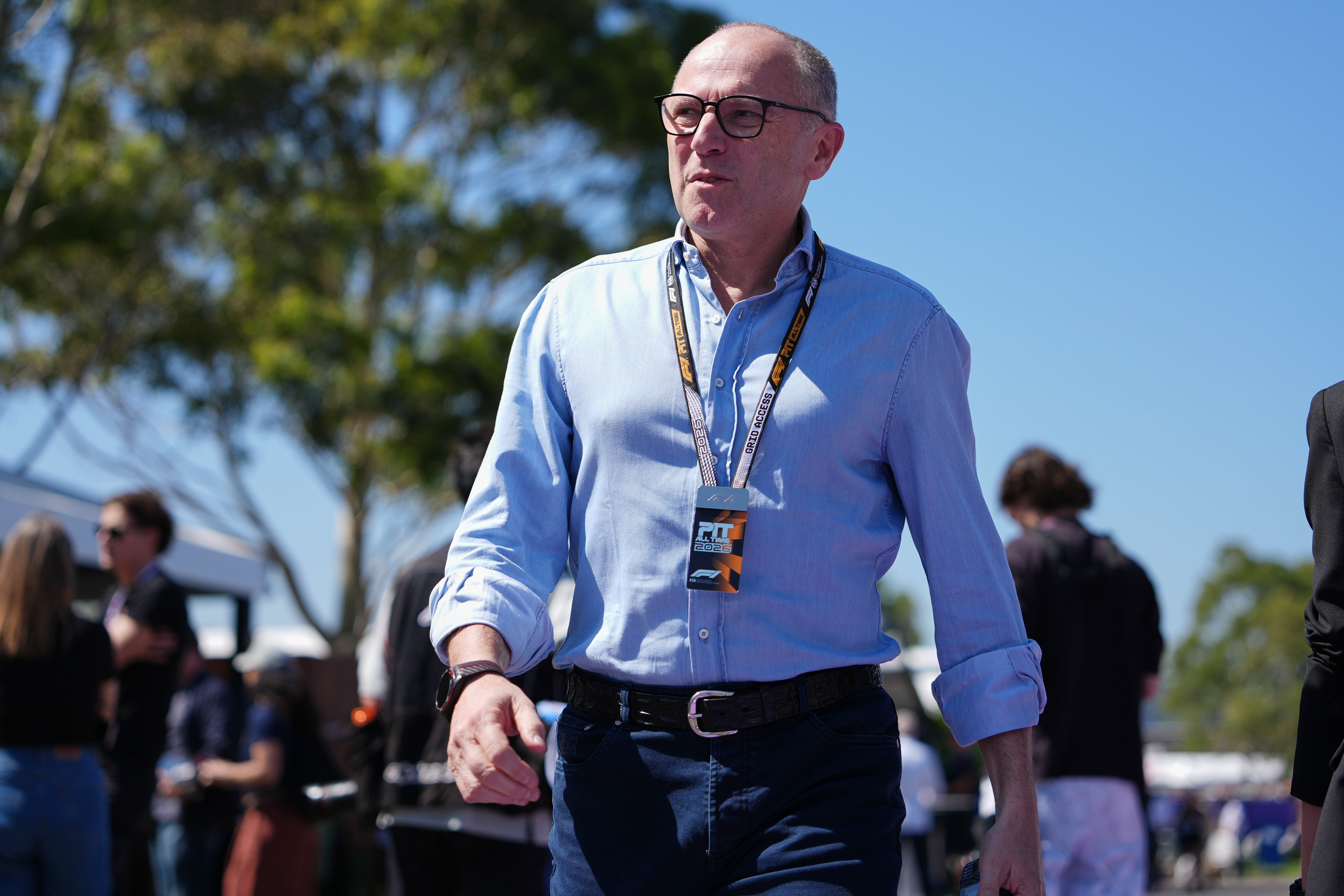 Stefano Domenicali walks down the F1 Paddock ahead of the Australian Formula One Grand Prix at Albert Park, in Melbourne, Australia