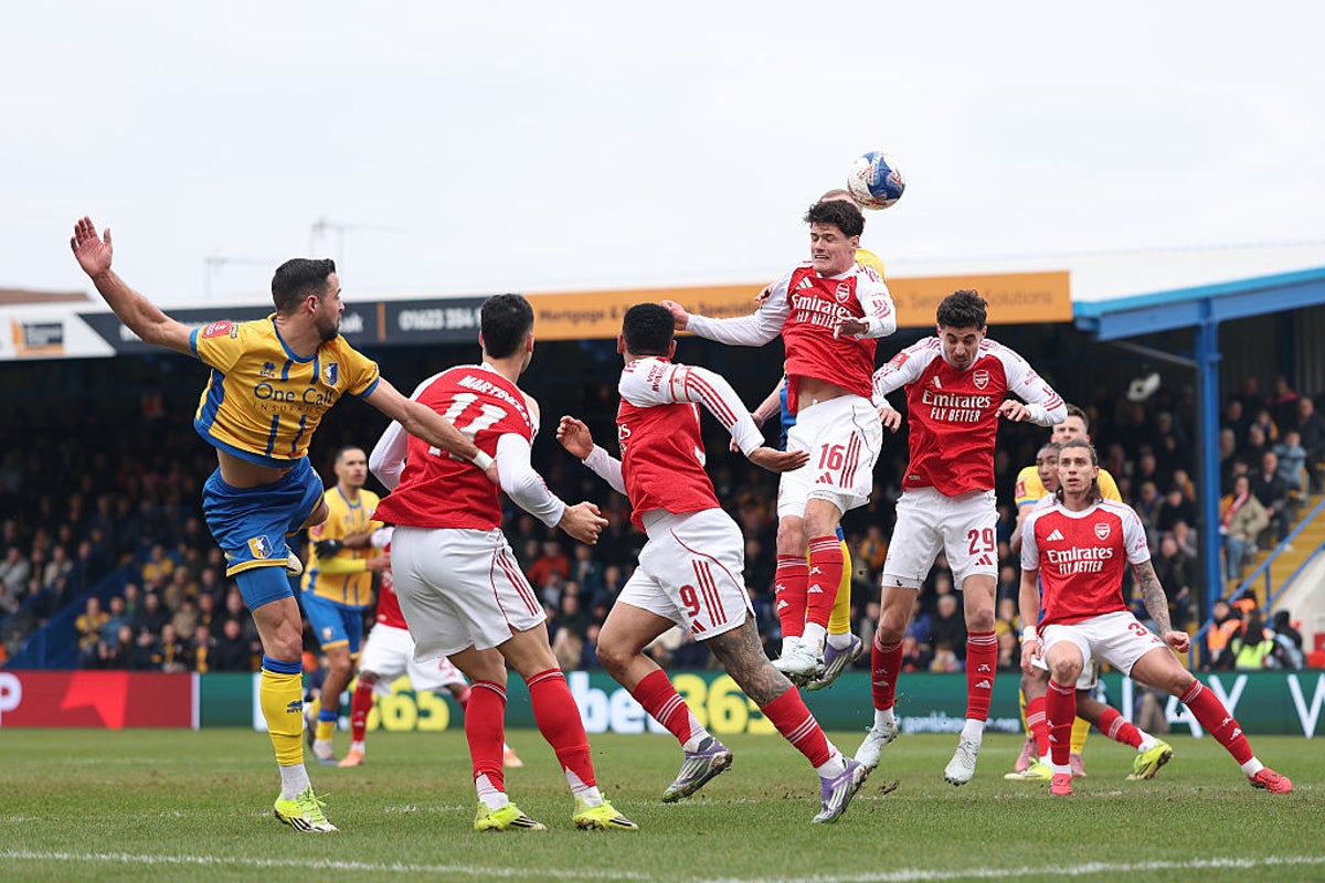 Arsenal survive Mansfield scare in close FA Cup tie