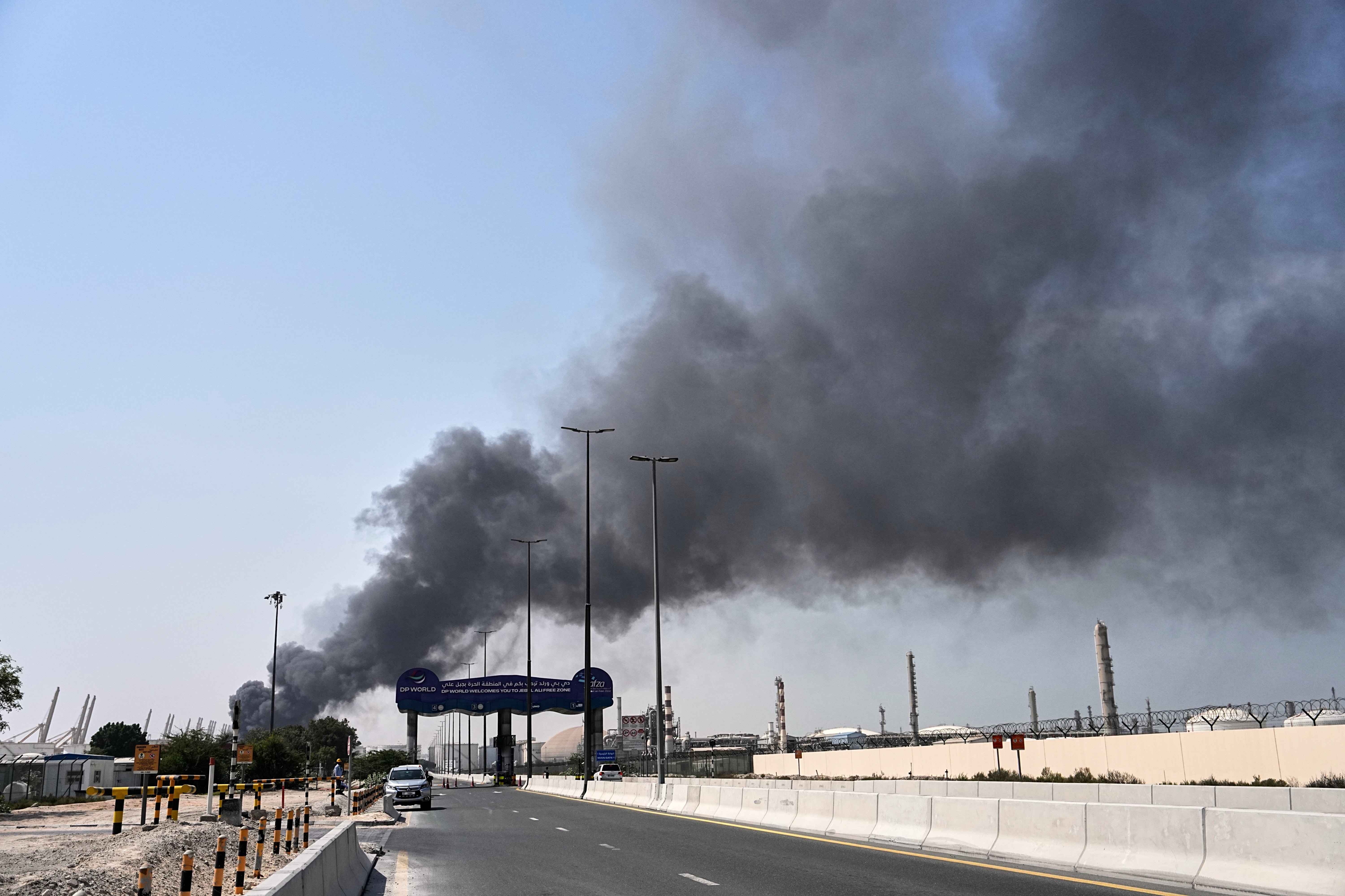 Smoke rises after an Iranian drone attack in the port area of Dubai, United Arab Emirates