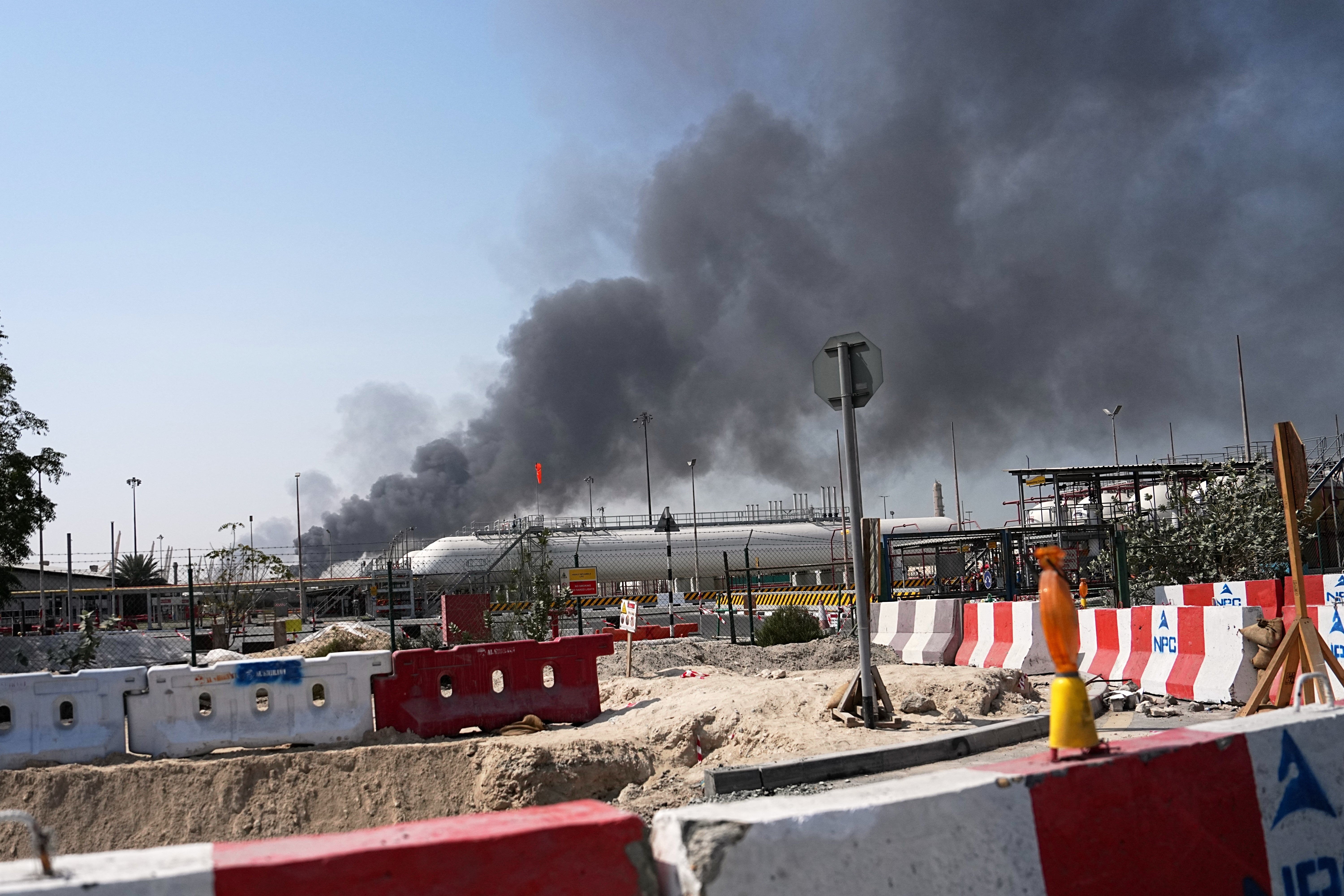 Smoke rises after an Iranian drone attack in the port area of Dubai