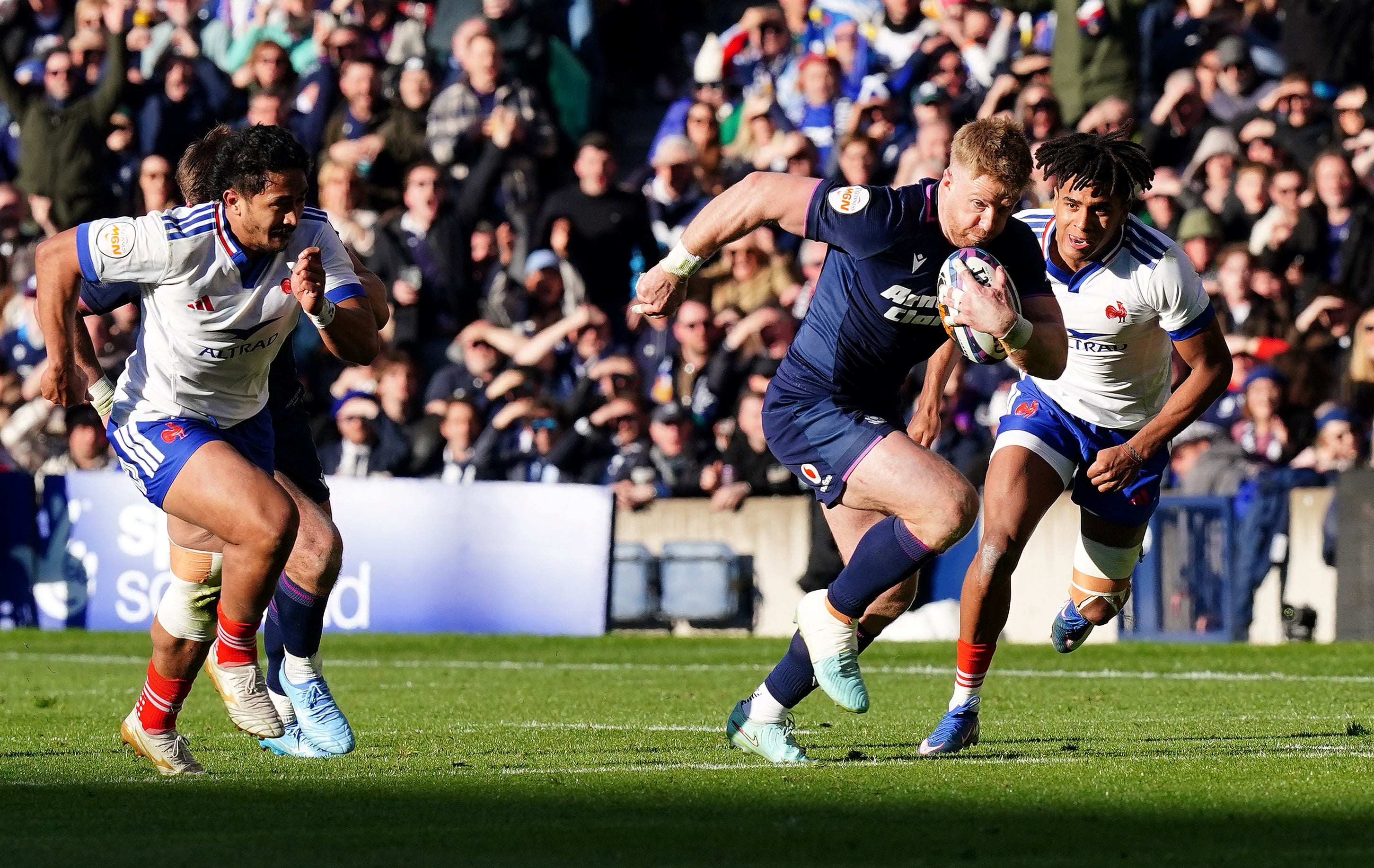 Scotland’s Kyle Steyn (centre) ran through and scored a try