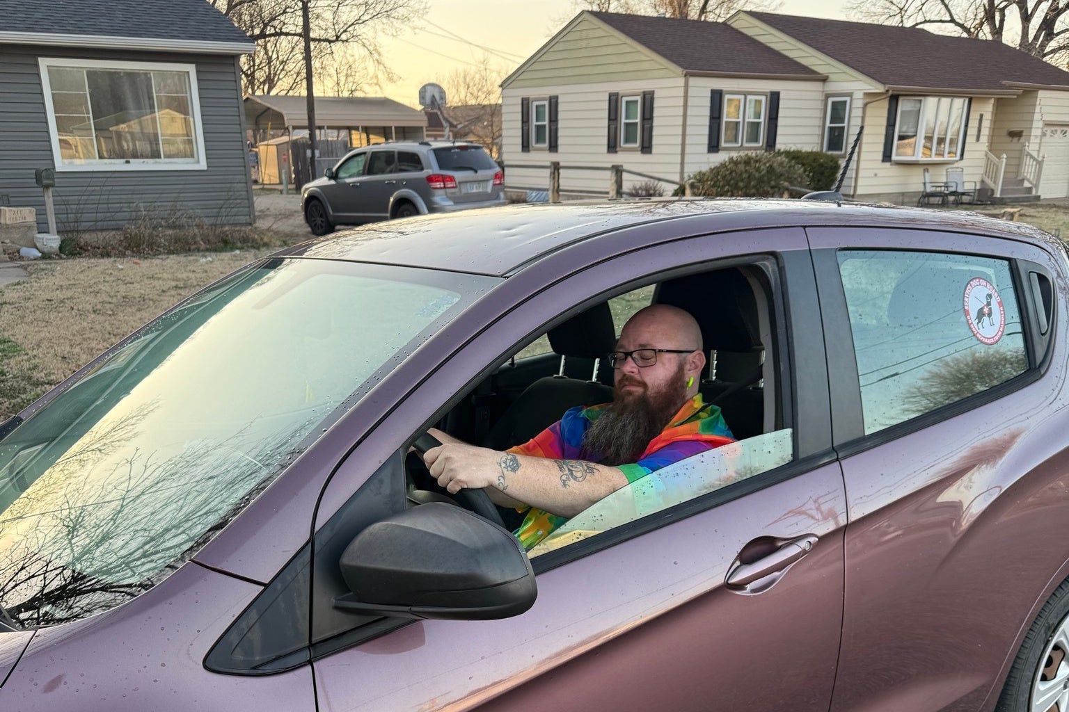 Neumann at the wheel of his 2020 Chevy Spark. Larned, Kansas is fairly remote — two hours from Wichita, three from Topeka — meaning he has to drive long streteches to attend events or observe court cases