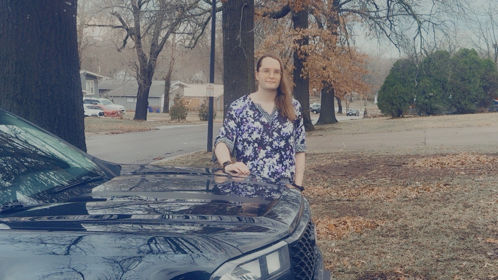 Iridescent Roney stands beside her car in Kansas City, Missouri, from where she commutes regularly into Kansas for her job. The new law invalidated her old birth certificate, which she had gone through the legal process to change from ‘male’ to ‘female’