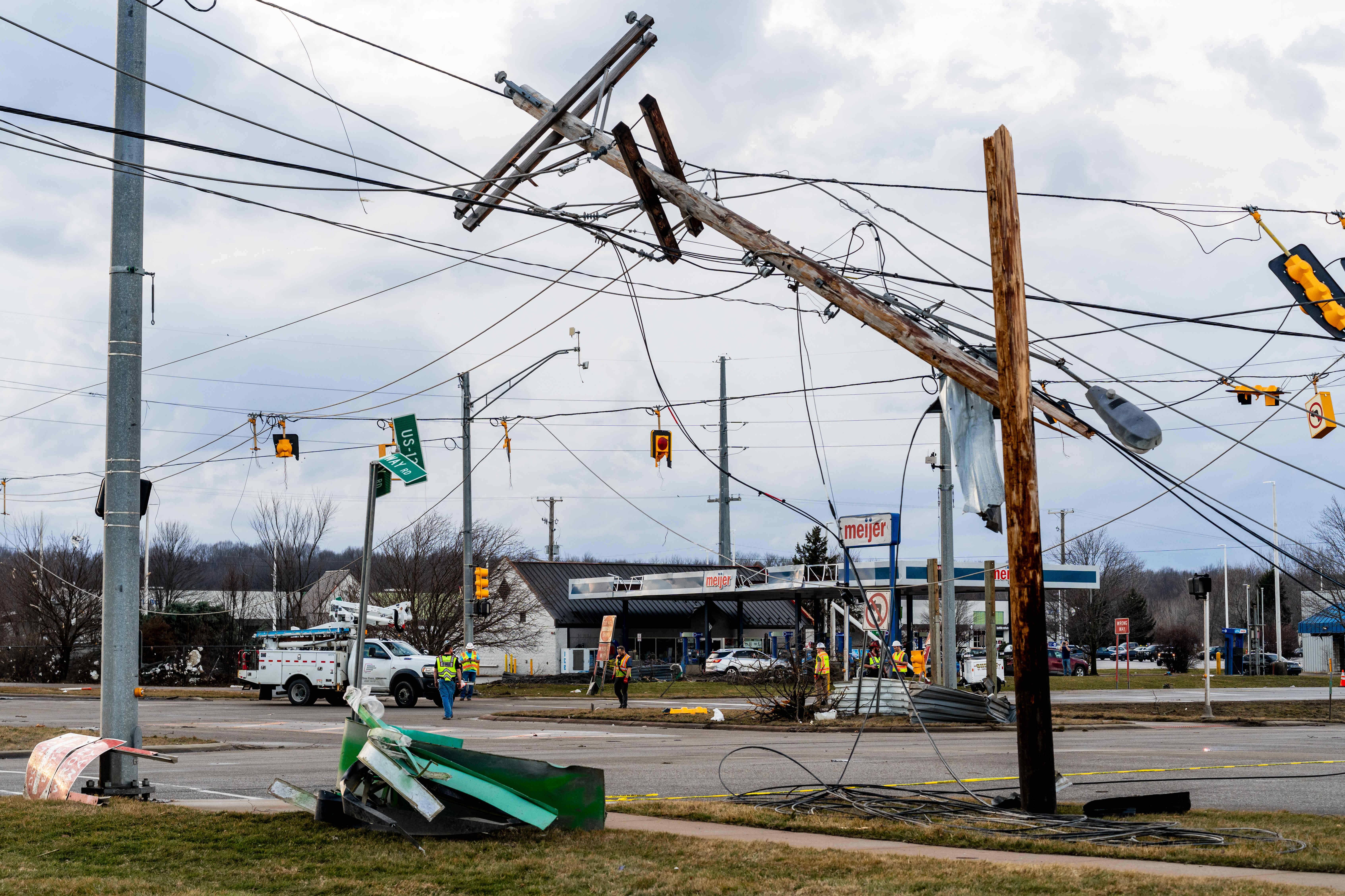 Damage is seen to power lines and traffic signals after a reported tornado in Three Rivers, Michigan