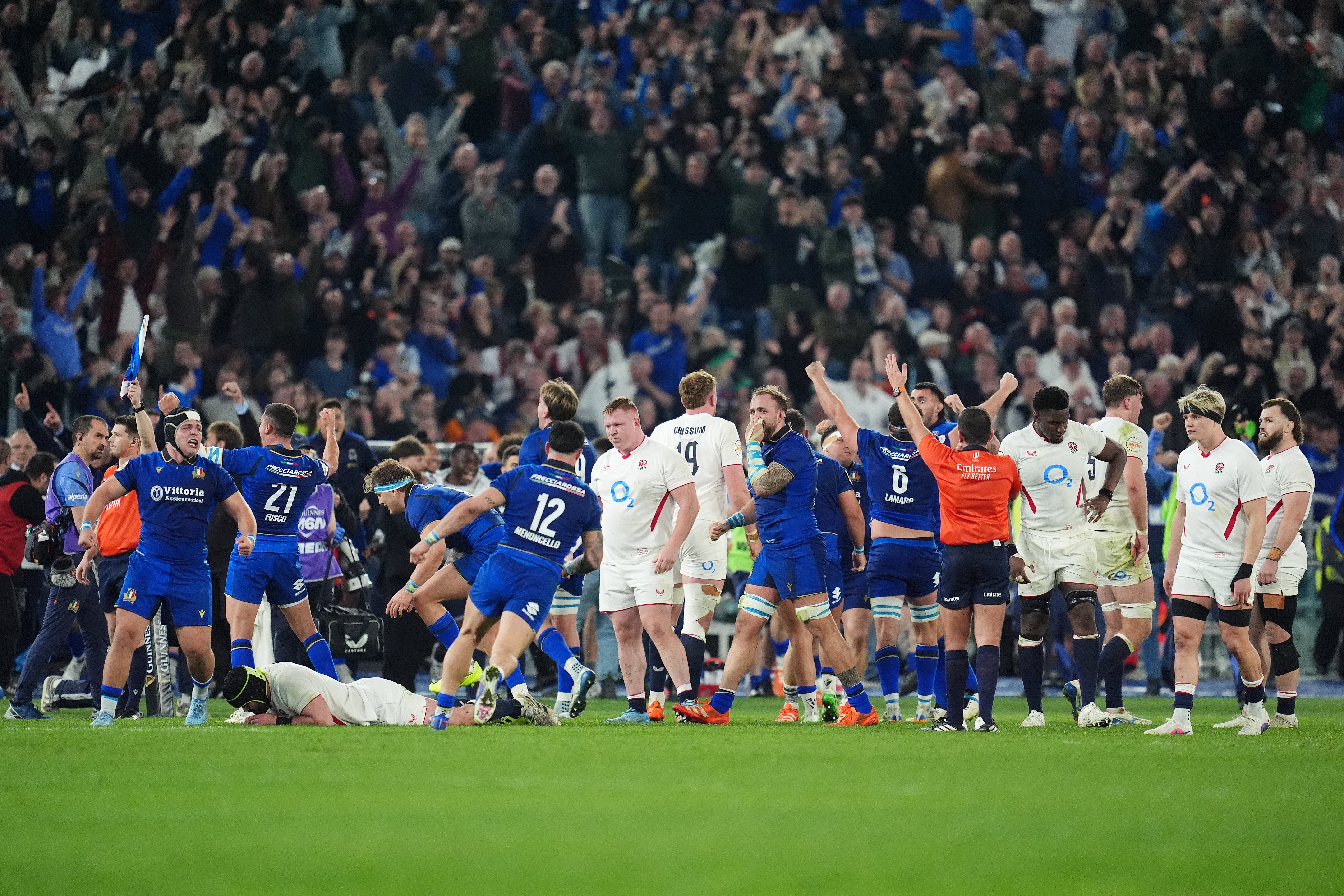 Italy players celebrate at full-time (Adam Davy/PA)