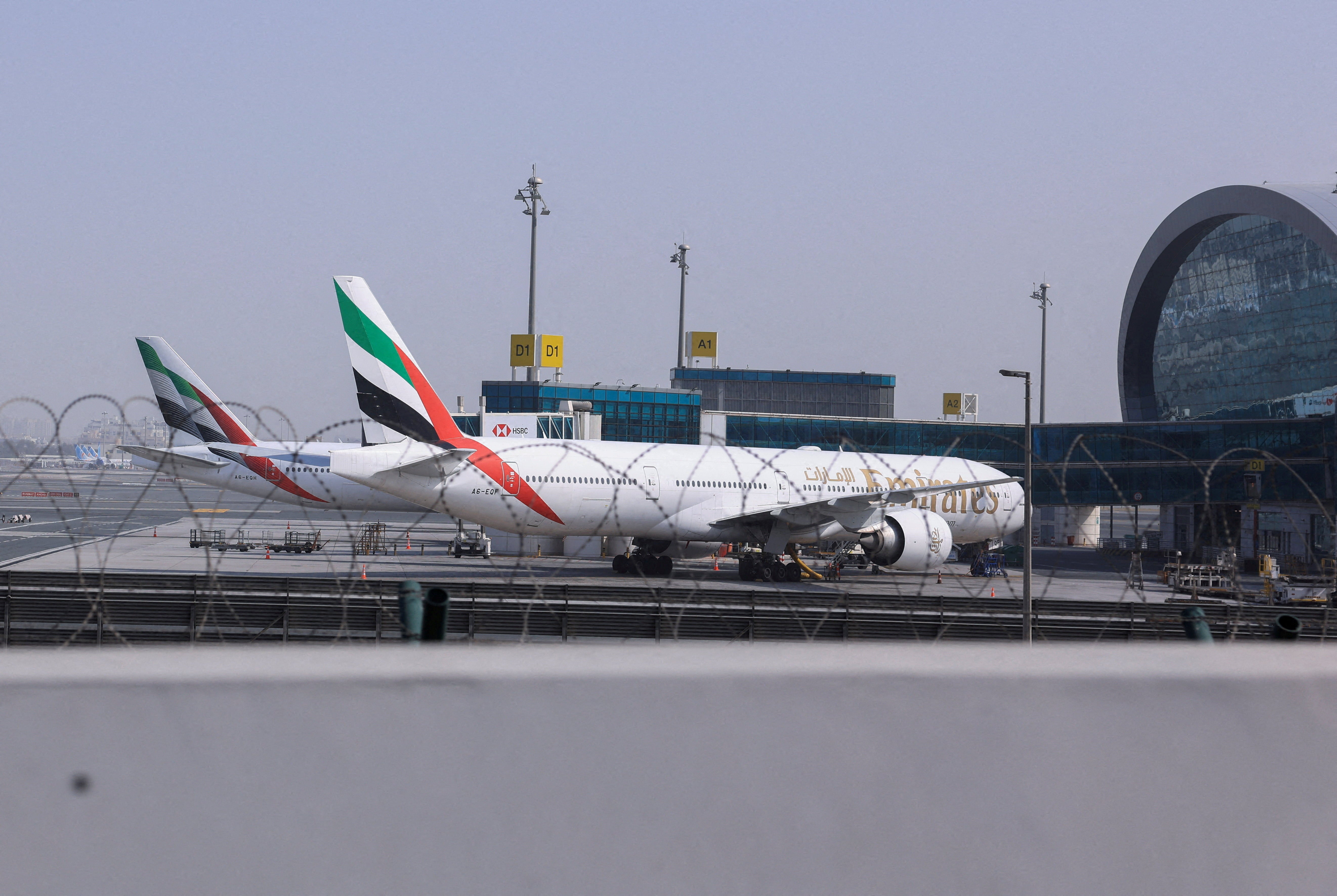 Planes are parked at Terminal 3 of the Dubai International Airport, following the United States and Israel strikes on Iran, in Dubai