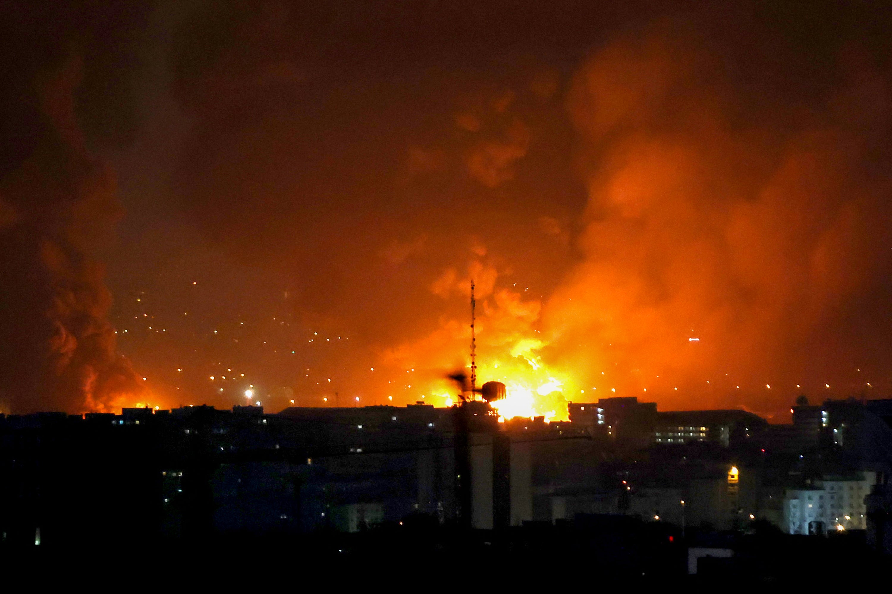 Massive flames rise from the site of airstrikes at Mehrabad International Airport in Tehran