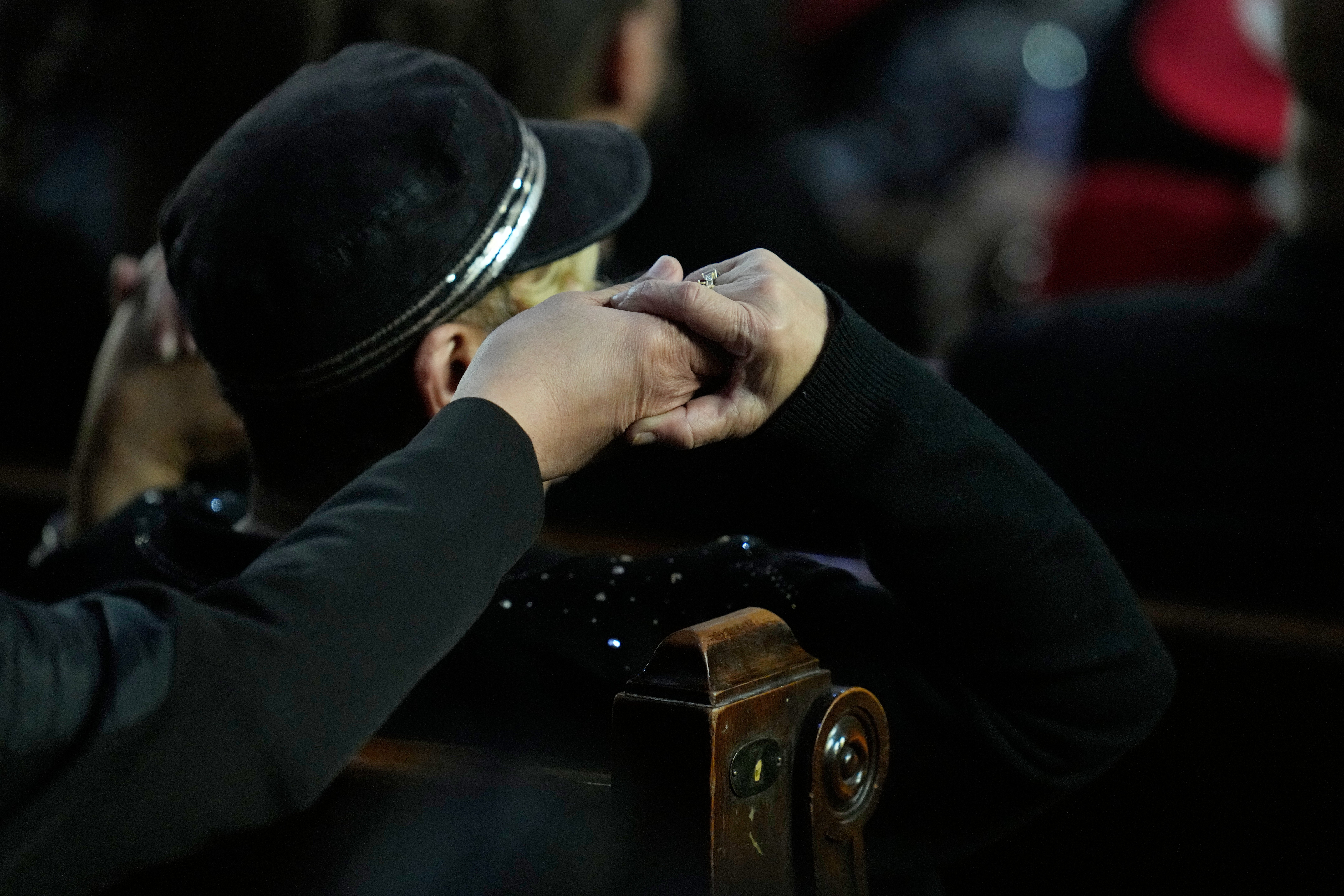A visitor listens during the Homegoing Celebration of Life for the Rev. Jesse Jackson