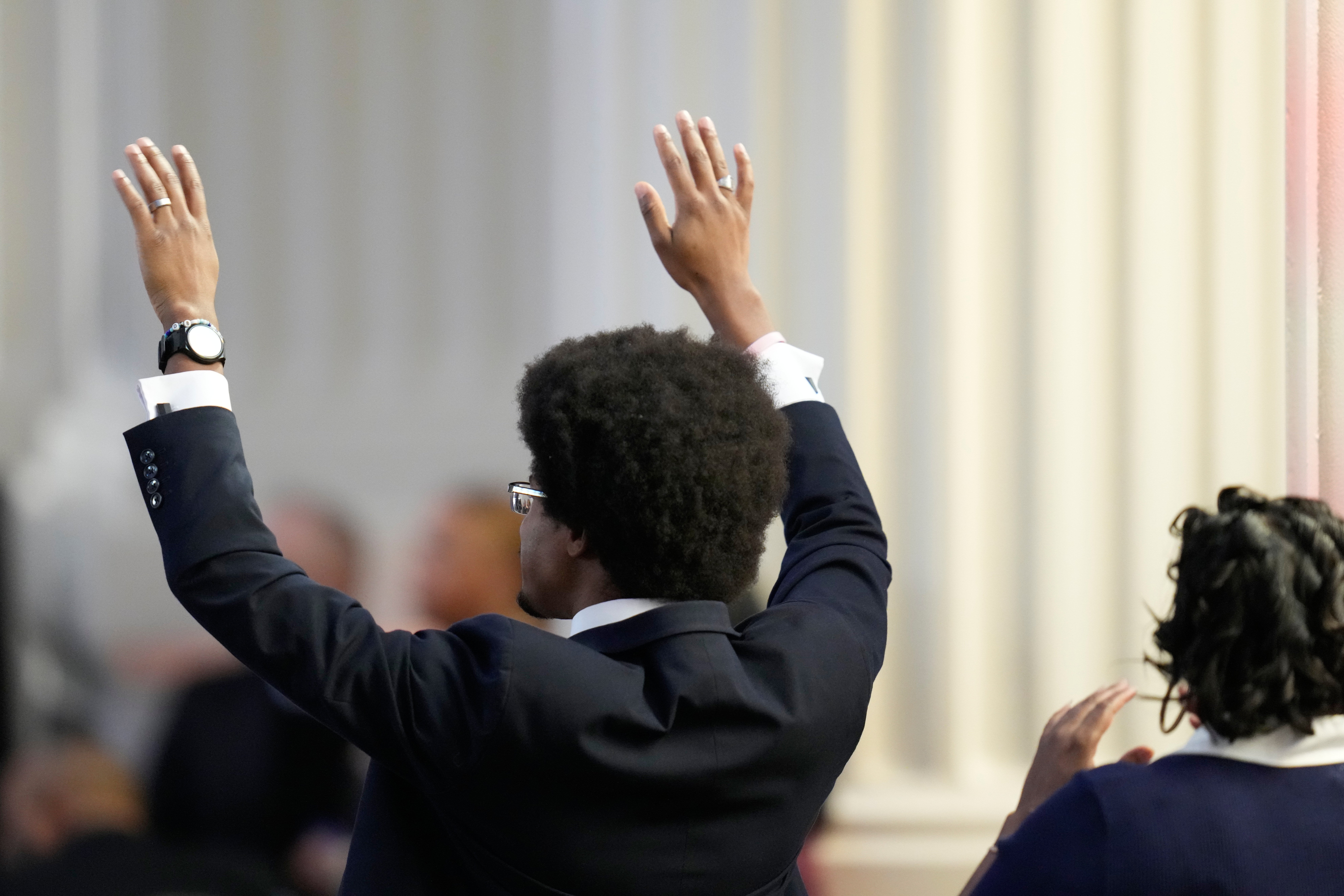 Tennessee state lawmaker Rep. Justin Pearson celebrates during the Homegoing Celebration of Life for the Rev. Jesse Jackson
