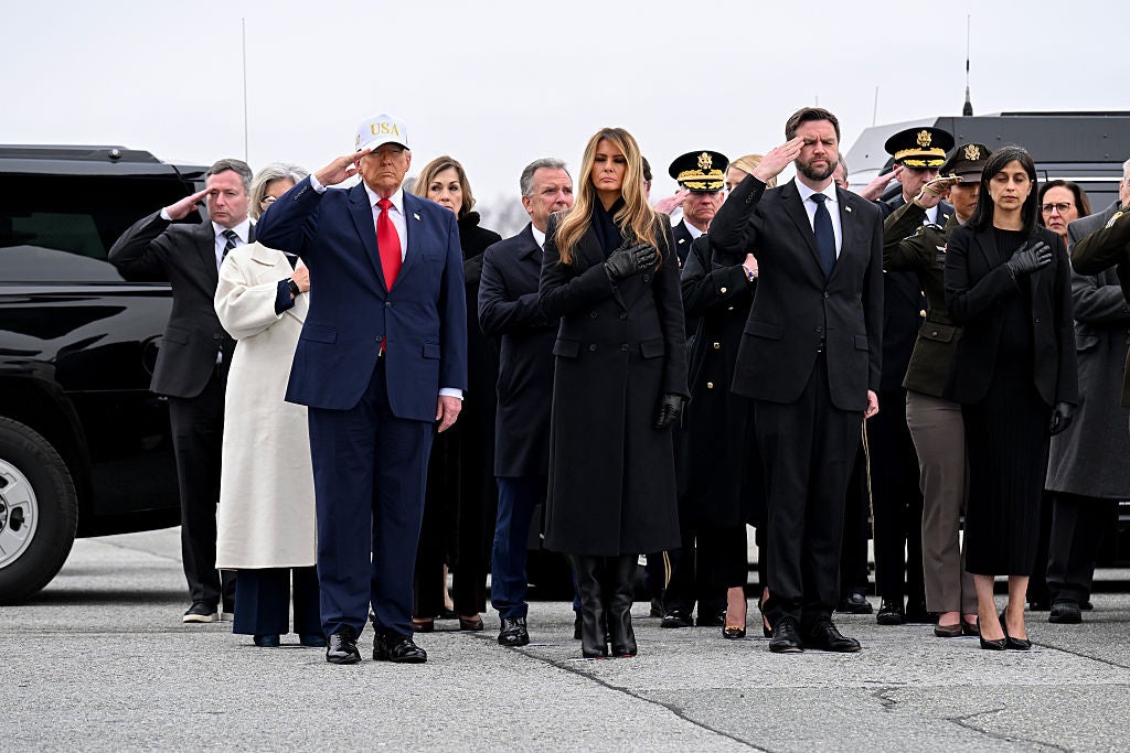 President Donald Trump, first lady Melania Trump and Vice President JD Vance attend a dignified transfer ceremony for U.S. service members killed in the Iran conflict