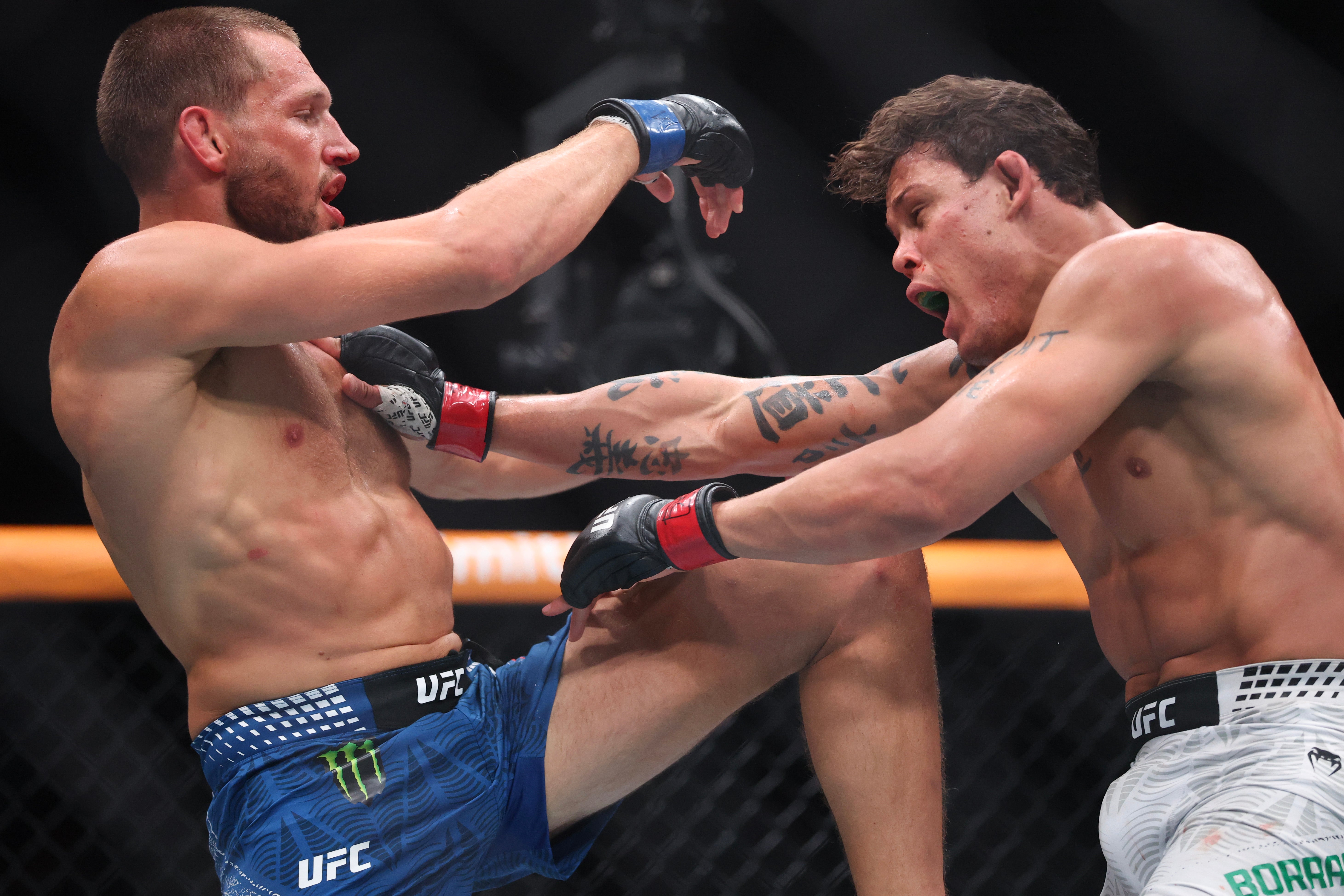 Caio Borralho (right) defeated Reinier de Ridder in the co-main event