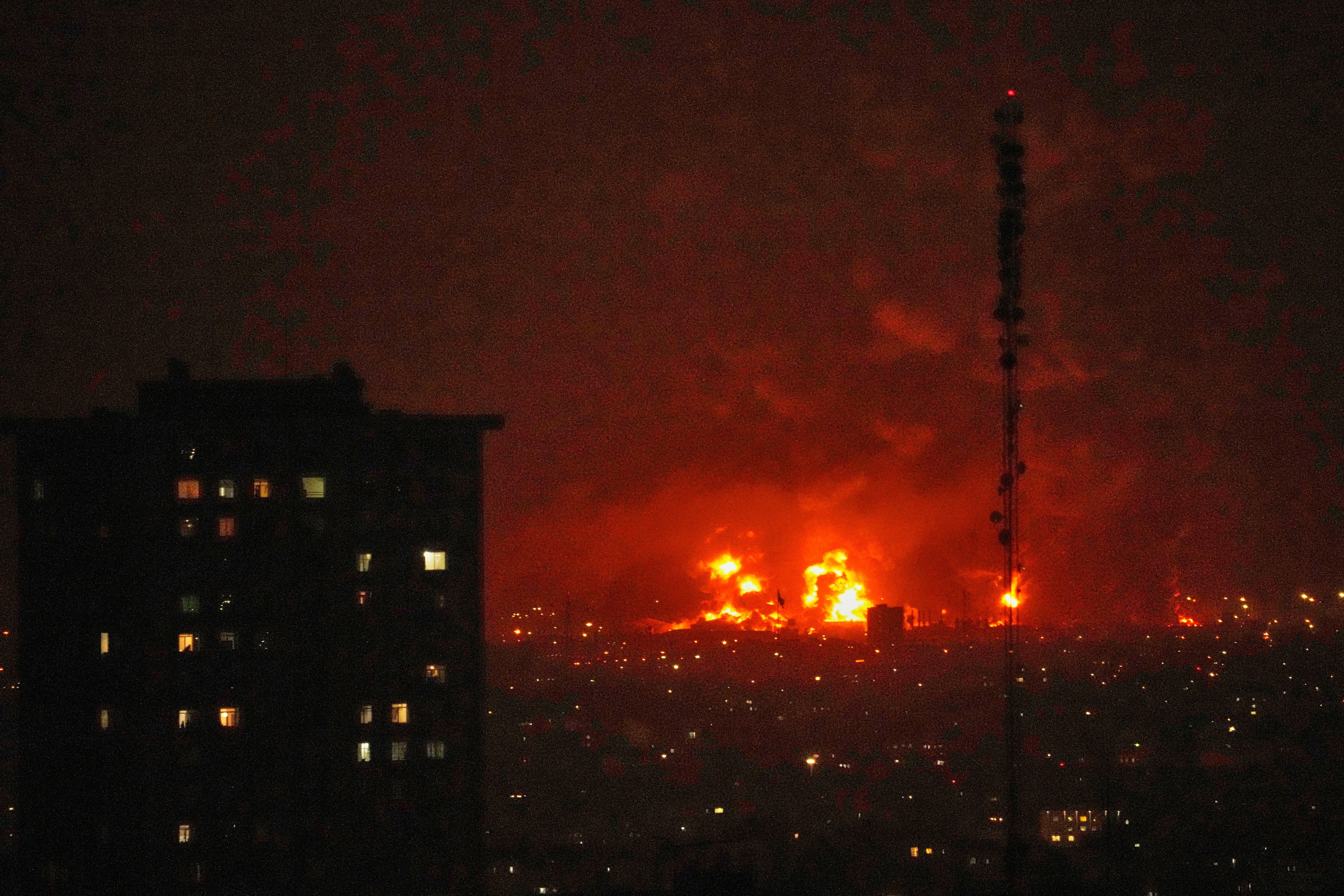 Flames rise from an oil storage facility south of the capital, Tehran, as strikes hit the city last weekend