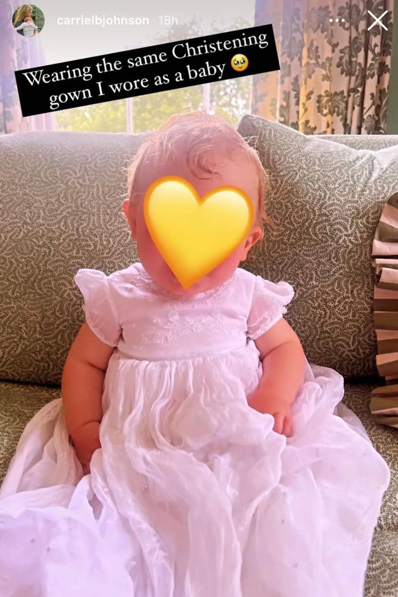 Carrie and Boris Johnson’s son Frank with a yellow heart emoji covering his face for his baptism in 2024