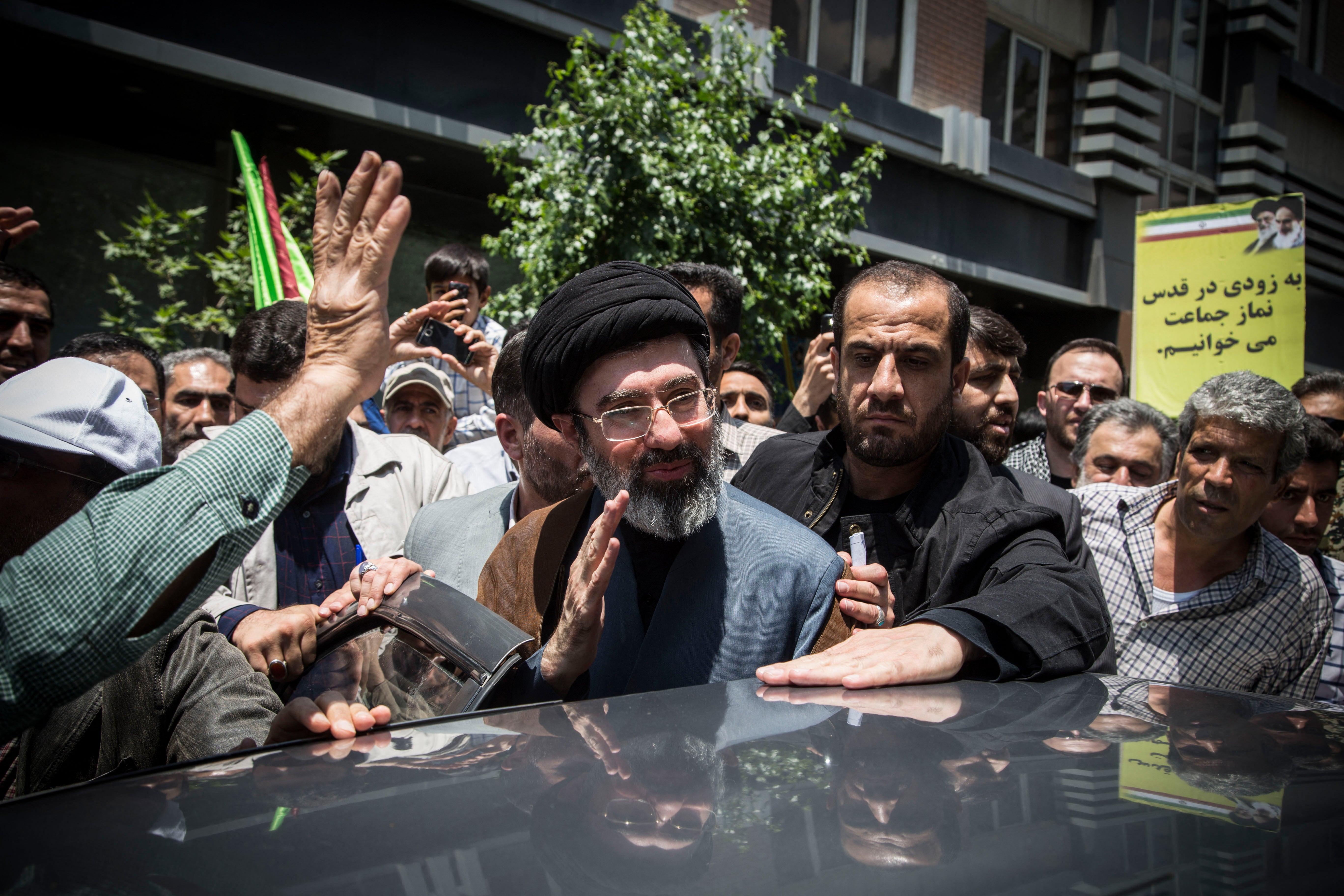 File: Mojtaba Khamenei (C), the son of the late Iranian Supreme Leader Ayatollah Ali Khamenei, participates in the annual Quds Day rally in Tehran in 2019