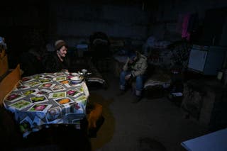 A picture shows local residents housing in a basement shelter in the settlement of Velyka Novosilka (Velikaya Novosyolovka) in the Donetsk region,