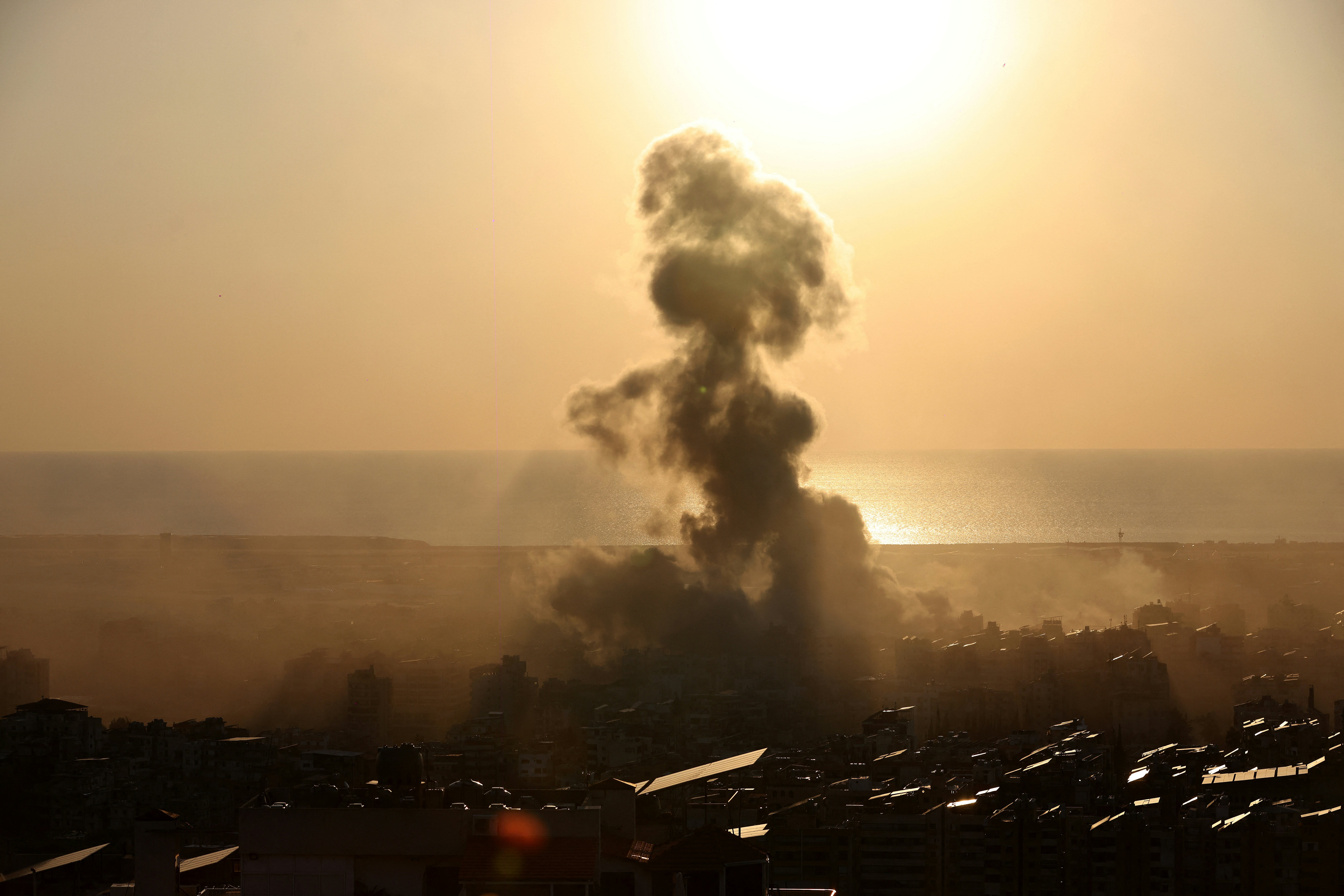 Smoke rises from the site of an Israeli airstrike that targeted an area in Beirut's southern suburbs on Tuesday