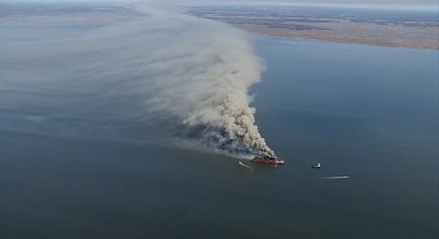 Massive fire erupts on scrap metal barge with smoke billows seen for ...