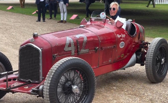 Jennifer Taylor driving a 1933 Alfa Romeo formerly owned by her late husband Hugh Taylor