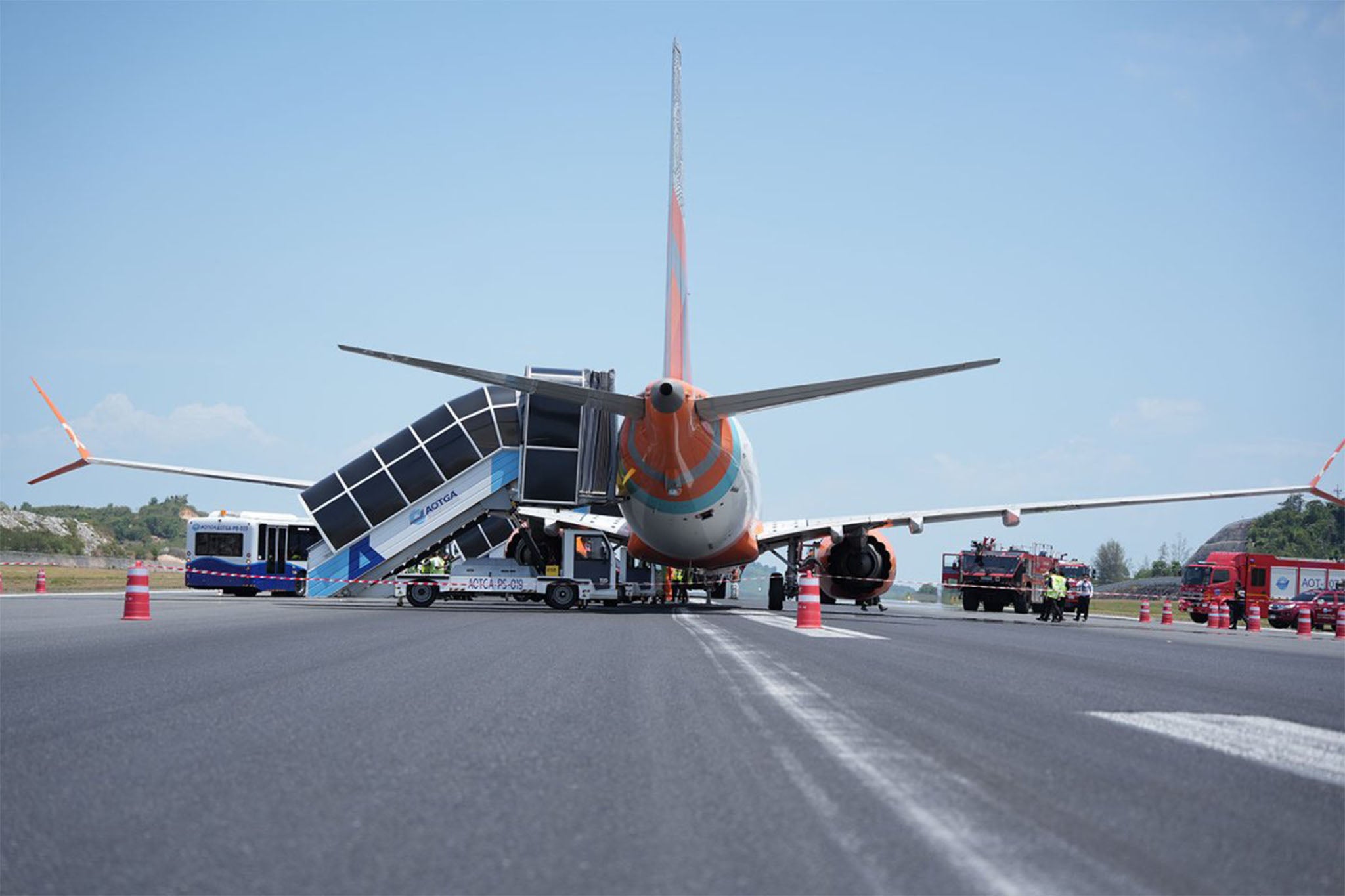 An Air India Express Boeing 737-300 sits on the runway at Phuket airport shortly after making a hard landing on Wednesday