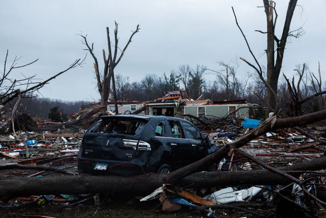 Two killed as tornadoes leave trail of destruction in Illinois and ...